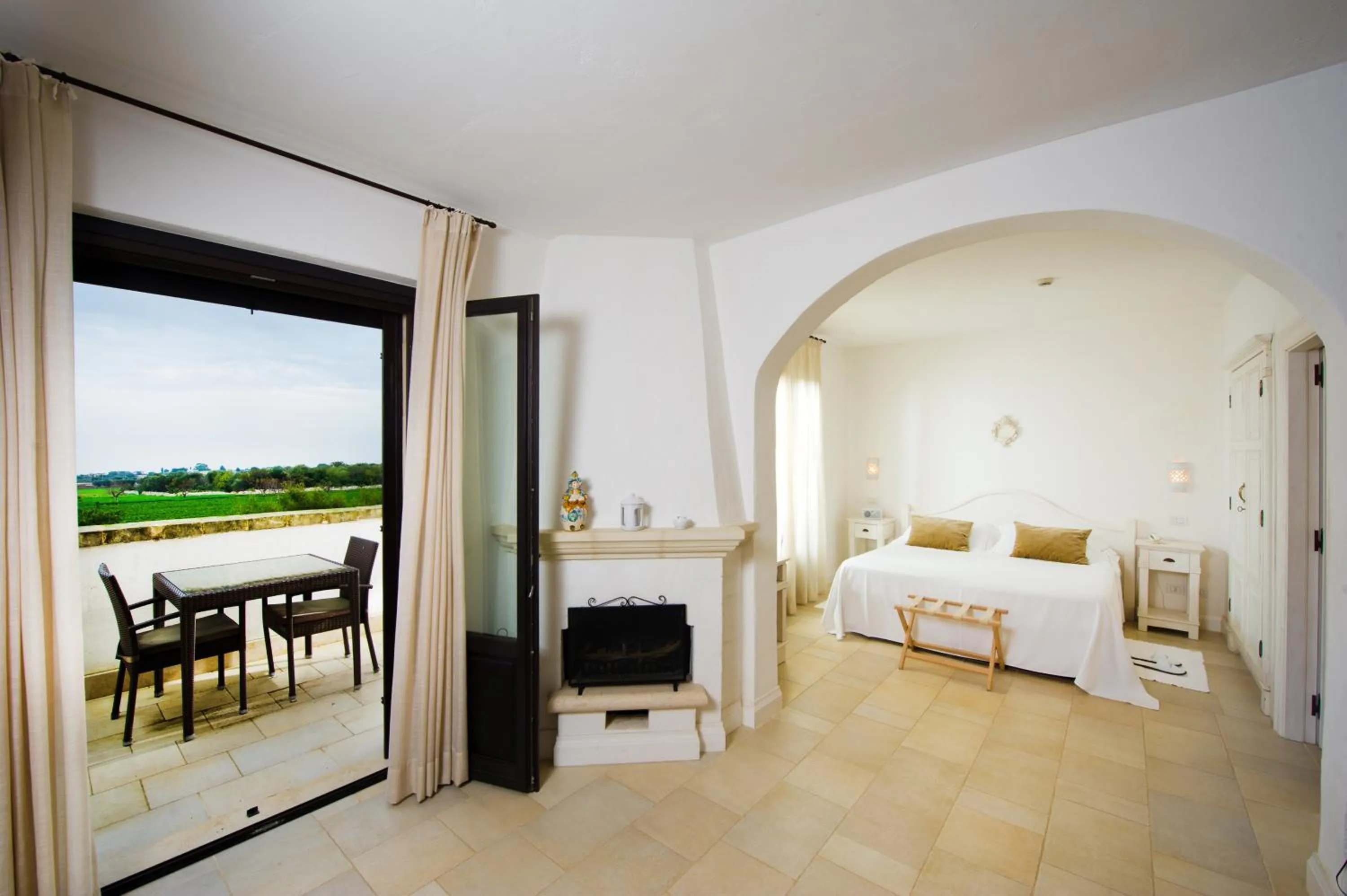 Balcony/Terrace, Bed in Borgobianco Resort & Spa Polignano - MGallery Collection