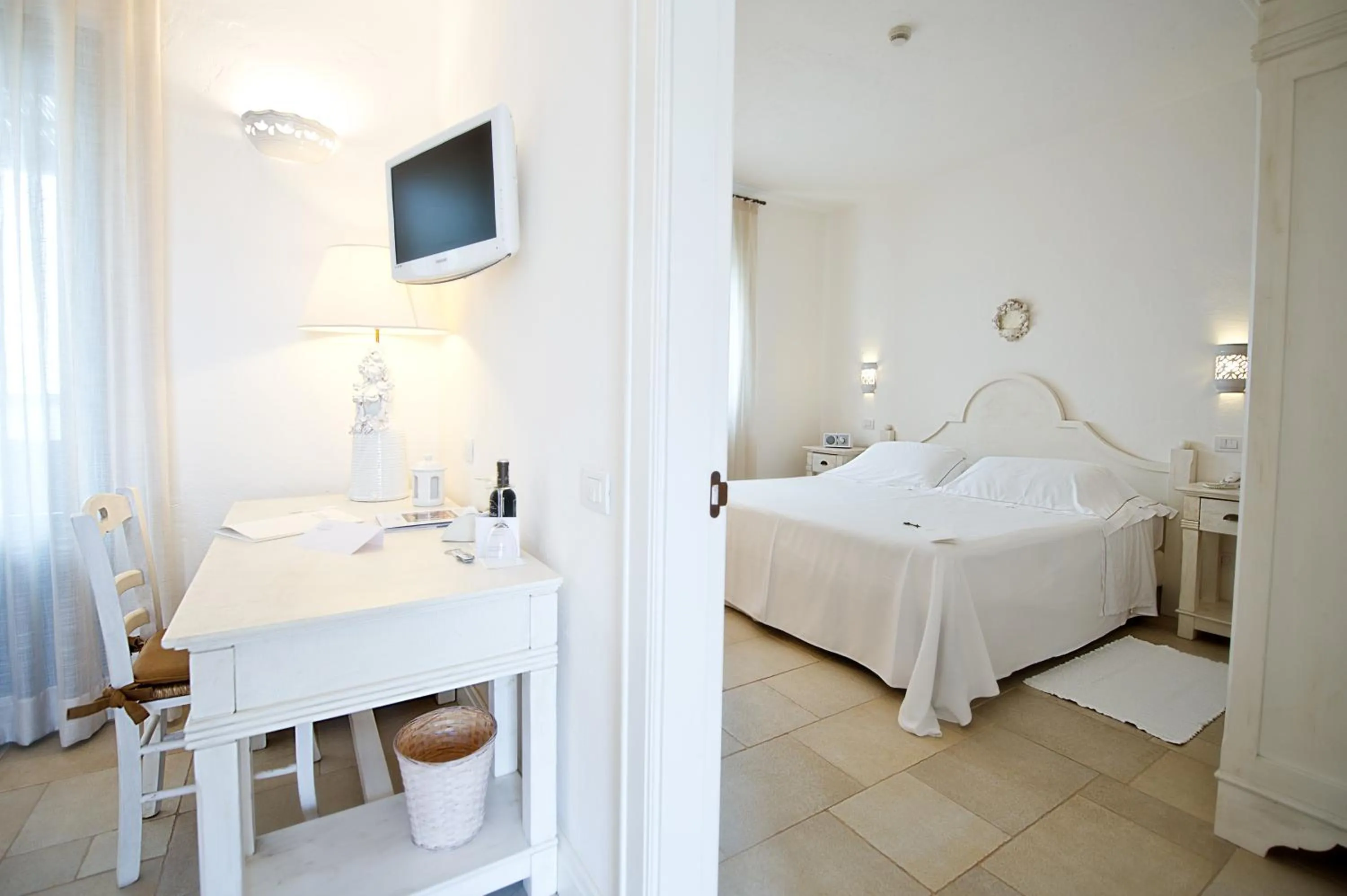 Photo of the whole room, Bed in Borgobianco Resort & Spa Polignano - MGallery Collection