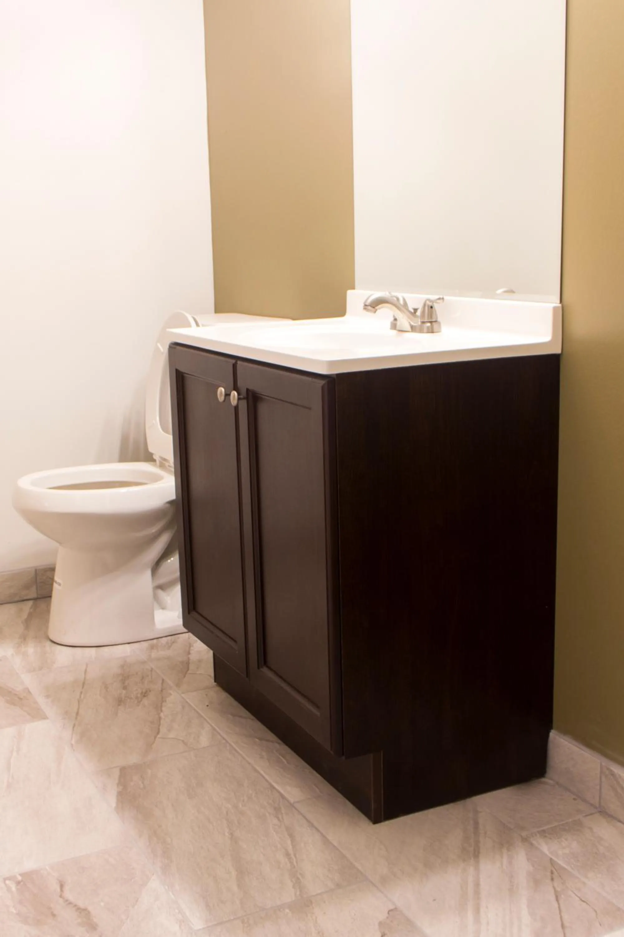 Toilet in Chateau Suites