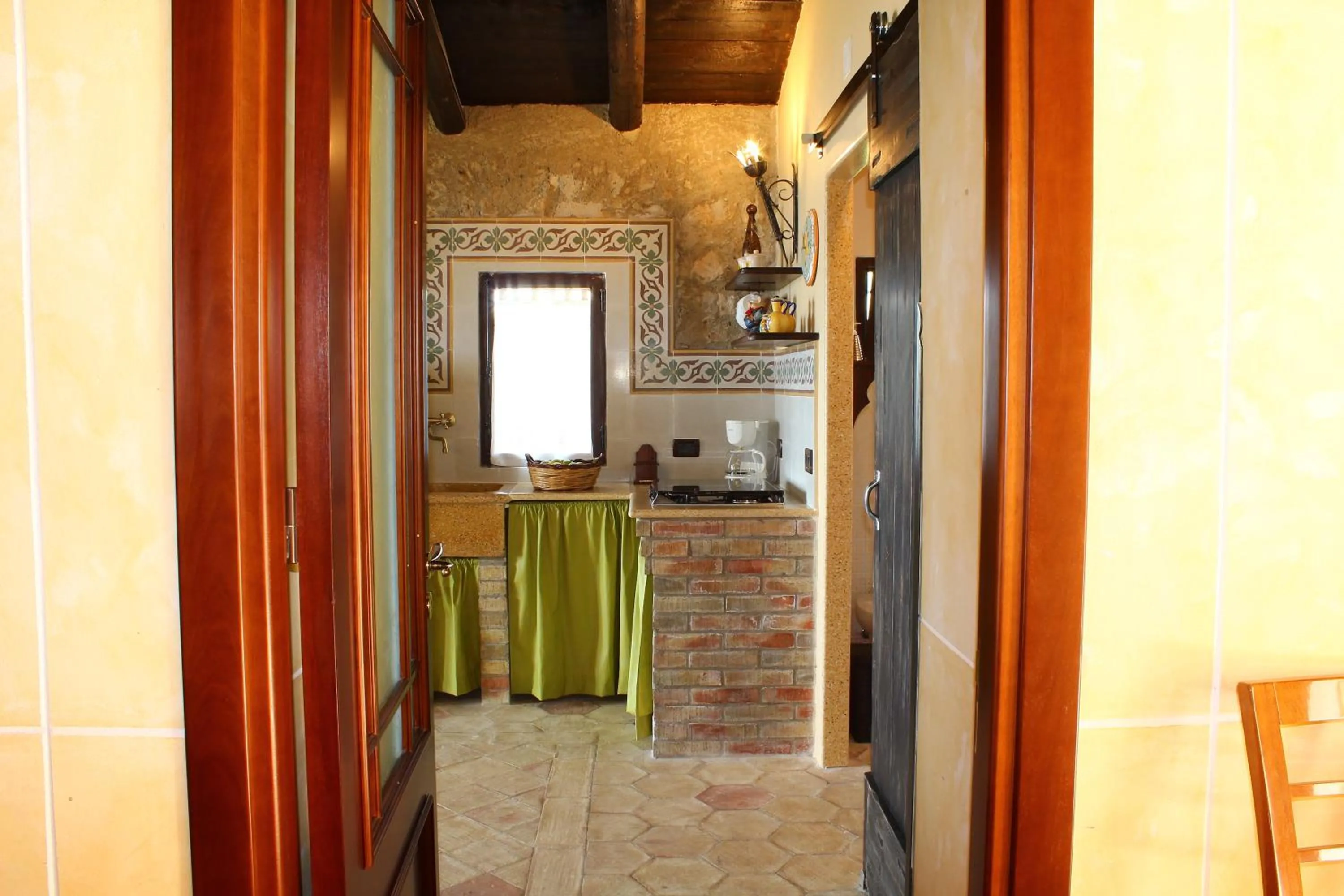 Kitchen or kitchenette in Casale Maddalena