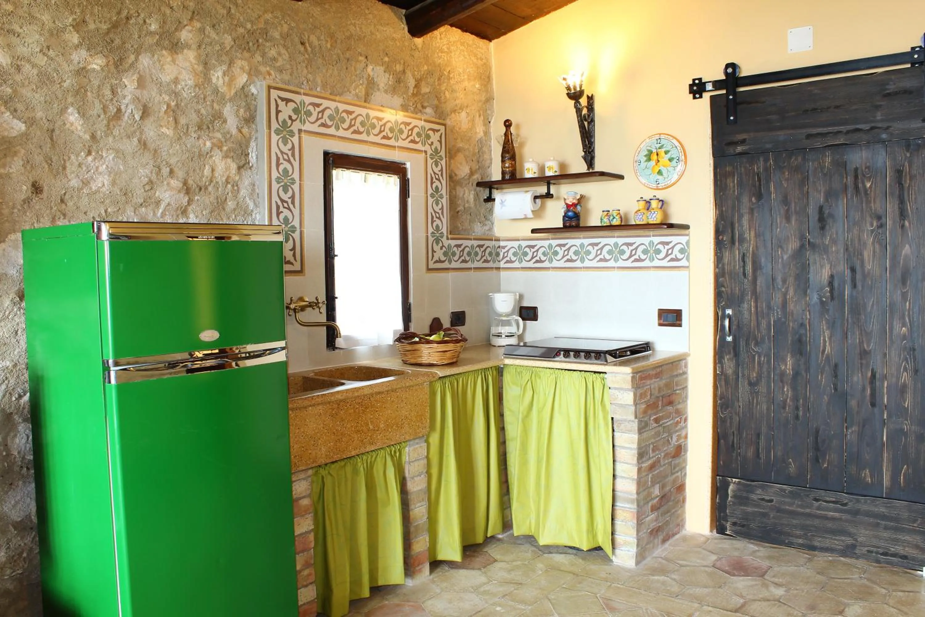 Kitchen or kitchenette in Casale Maddalena