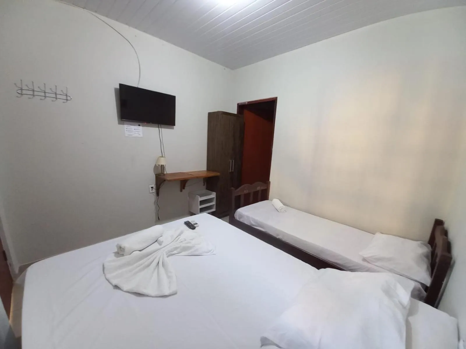 Bed in Pousada Rio Bonito