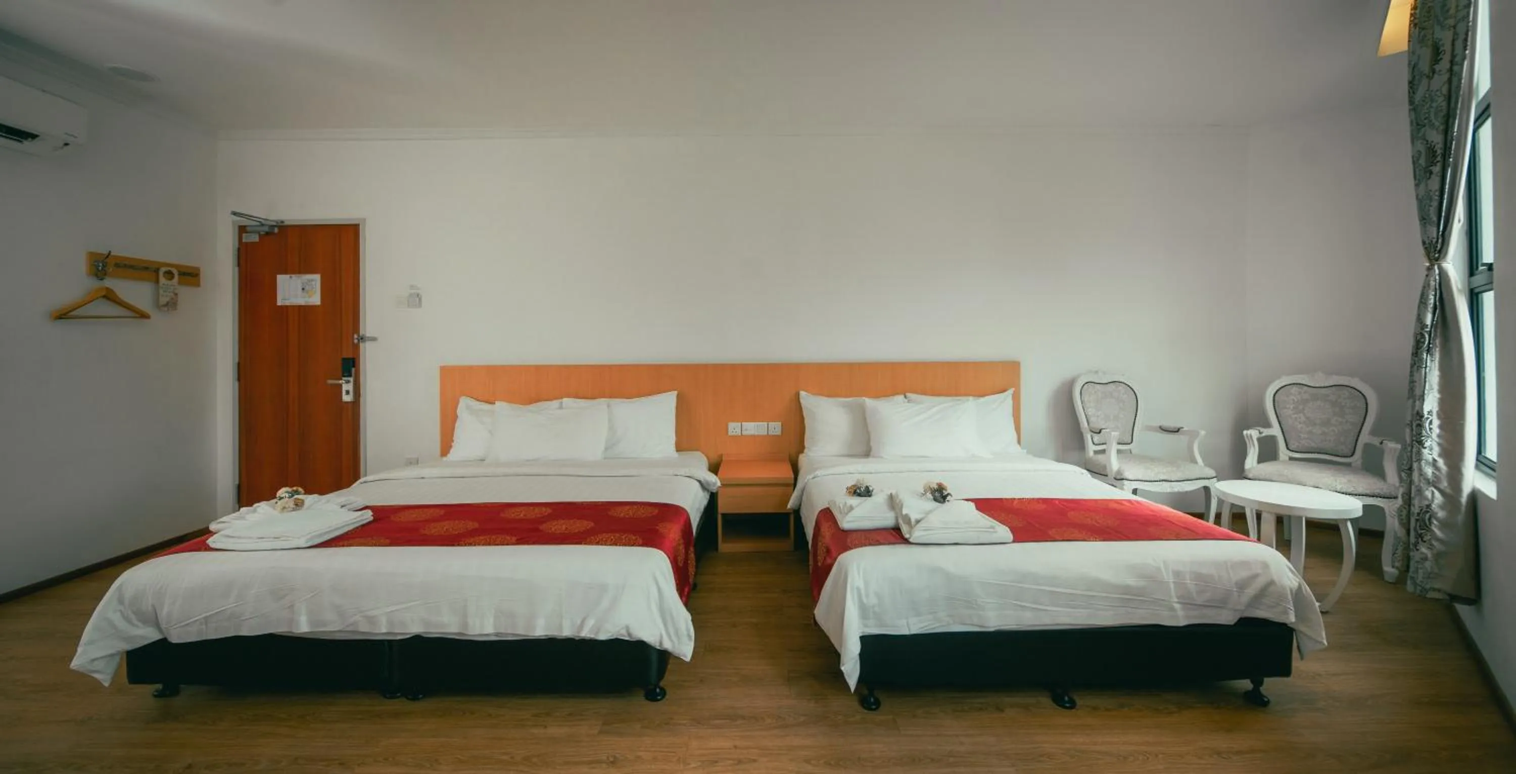 Photo of the whole room, Bed in 1 Million Hotel