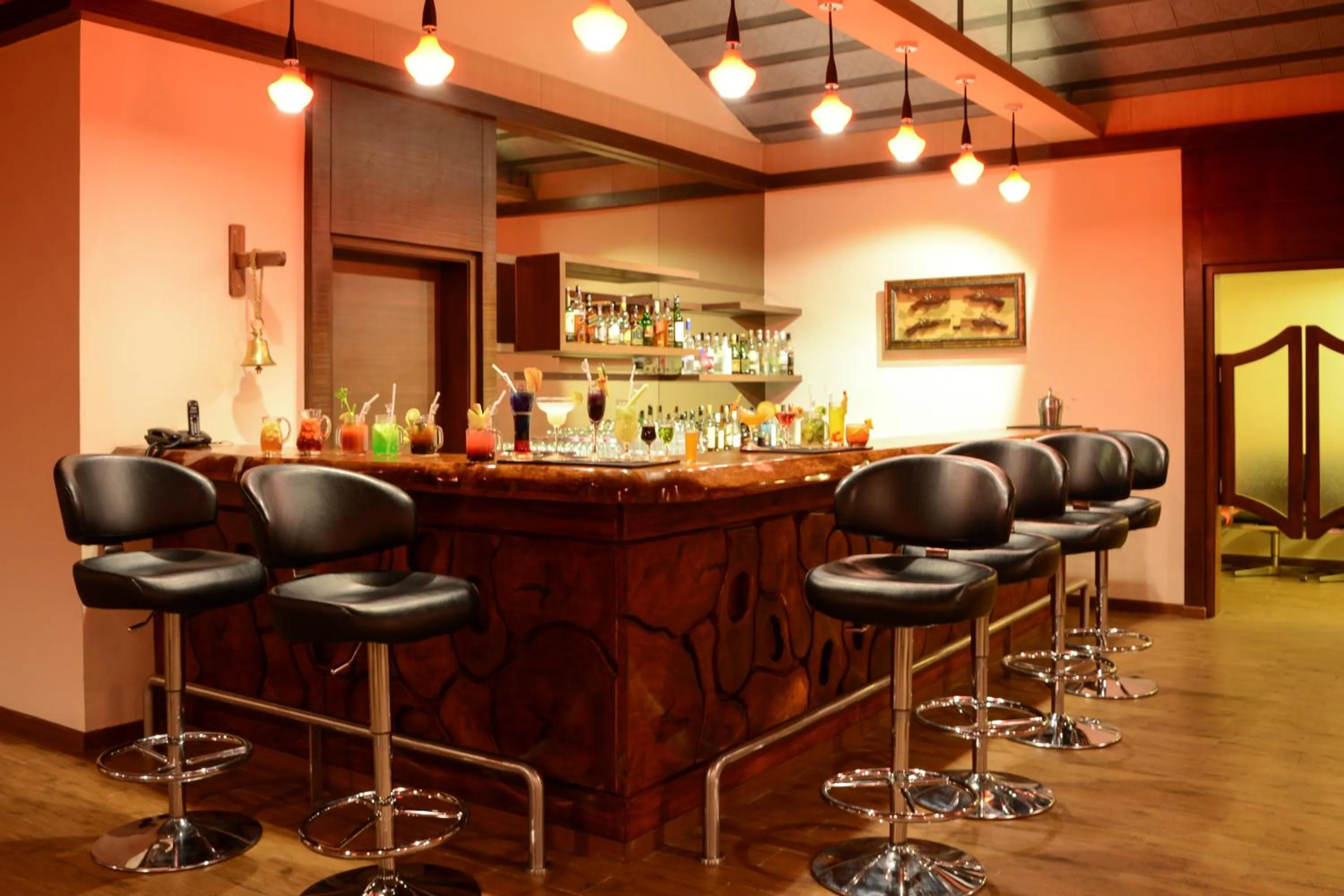 Lounge or bar in Purple Palms Resort & Spa