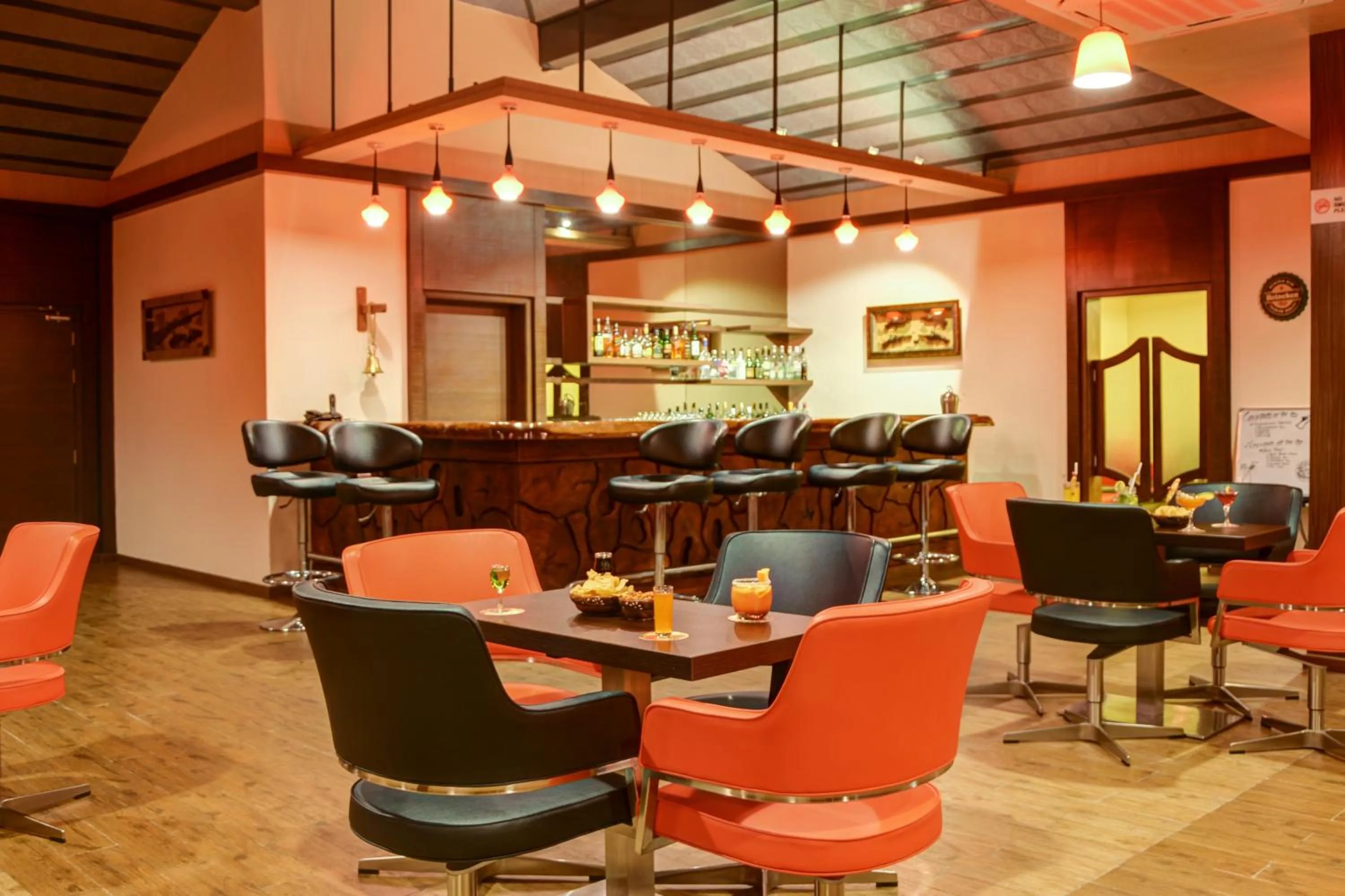 Lounge or bar in Purple Palms Resort & Spa