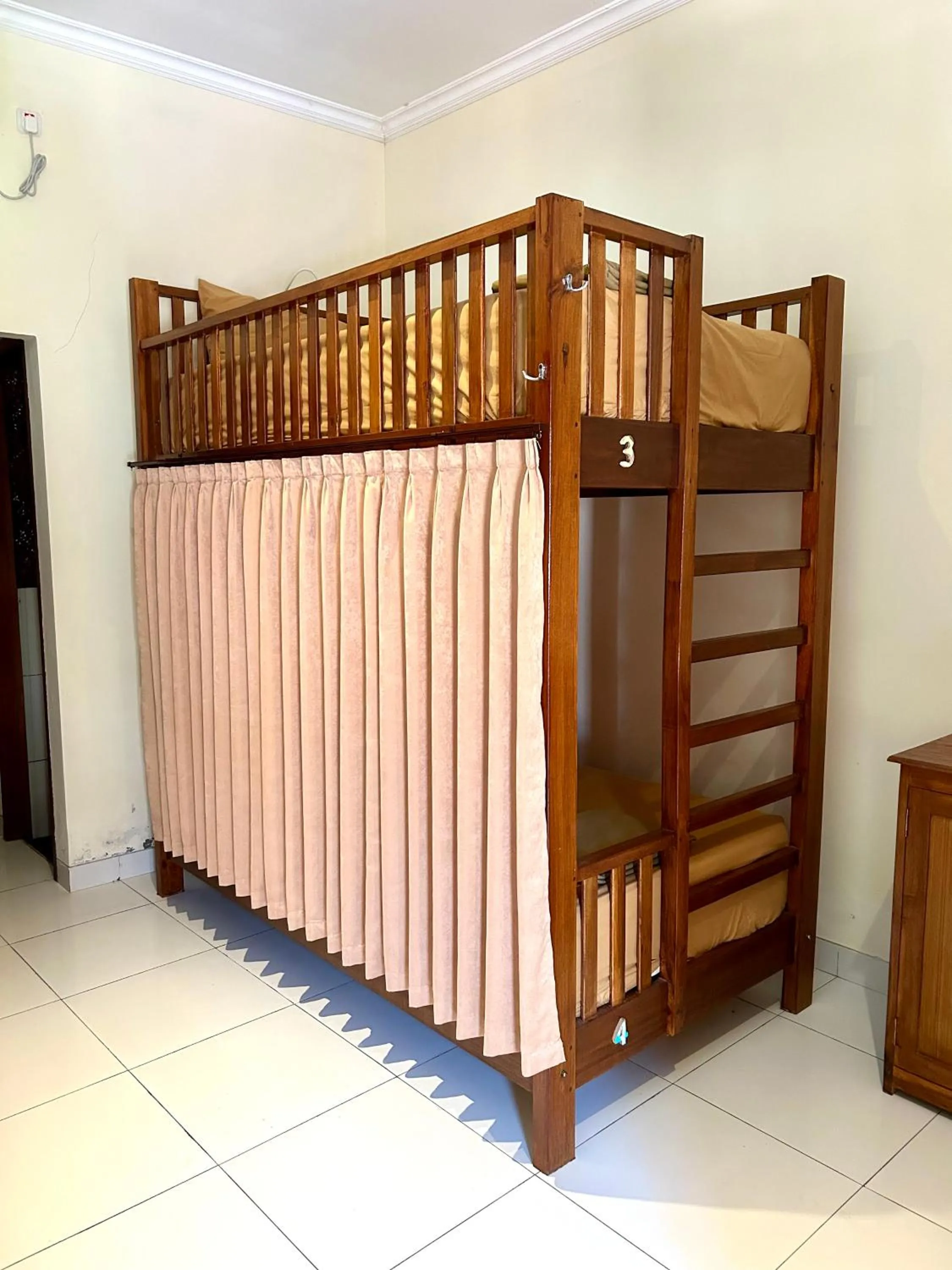 Bed in Nusa Garden Homestay