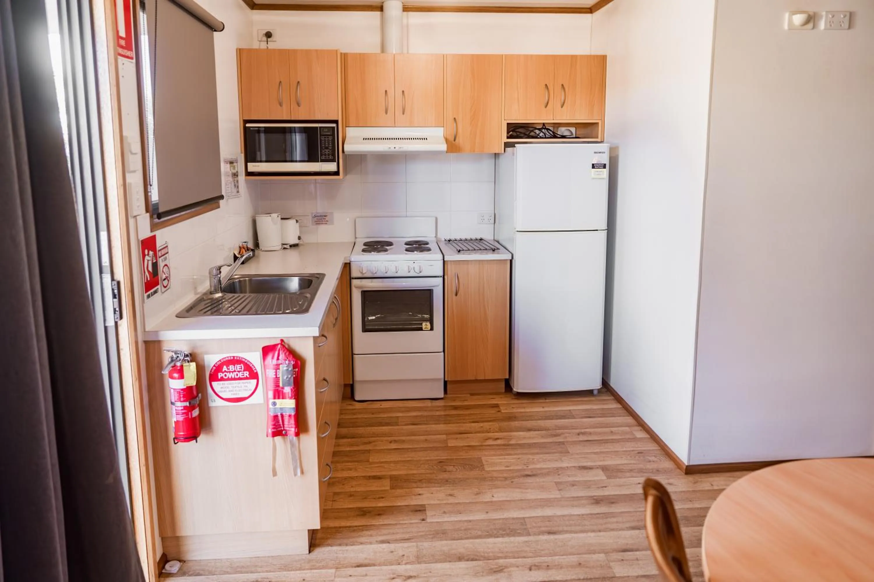 kitchen in The Sundowner Cabin & Tourist Park