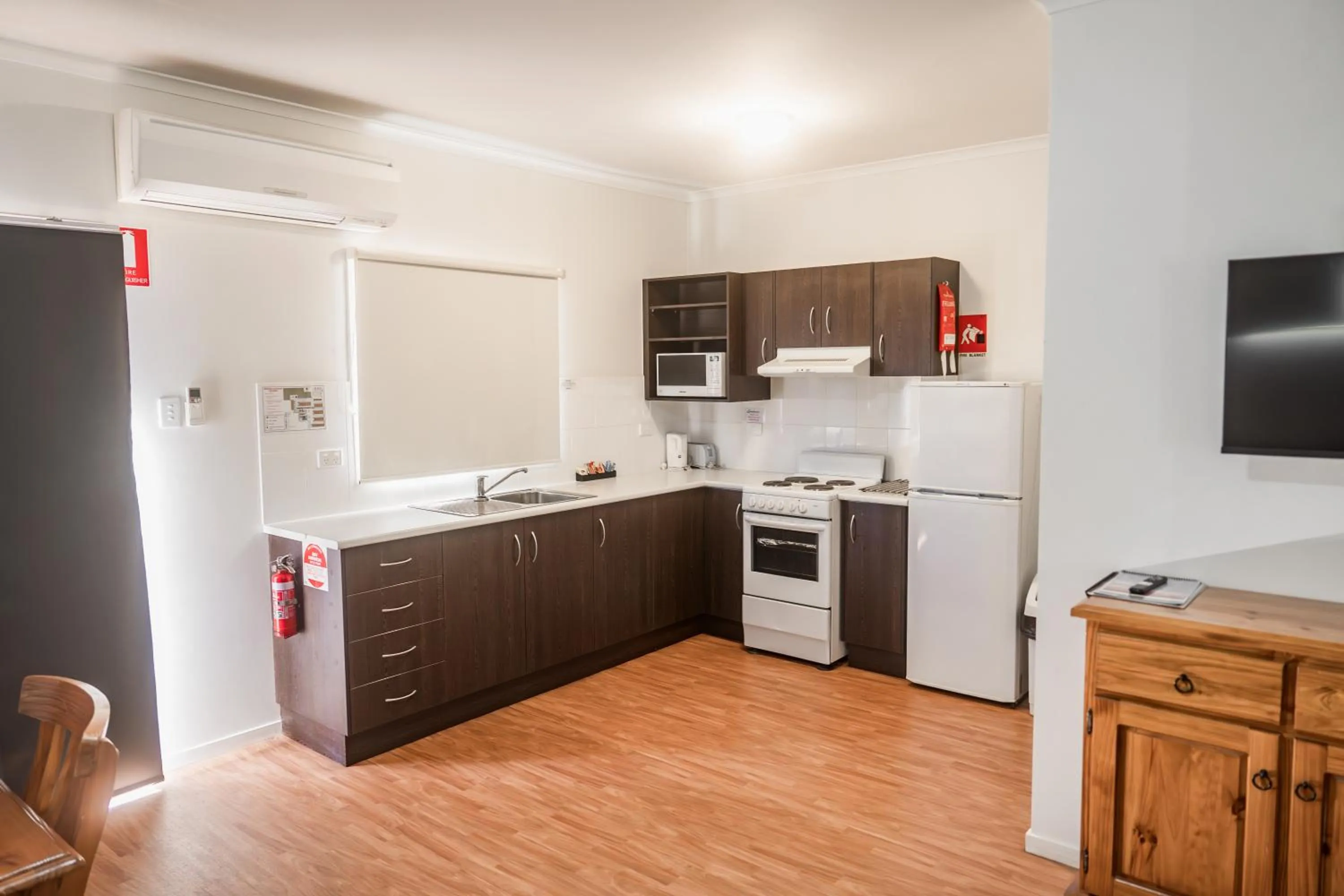 Kitchen or kitchenette in The Sundowner Cabin & Tourist Park