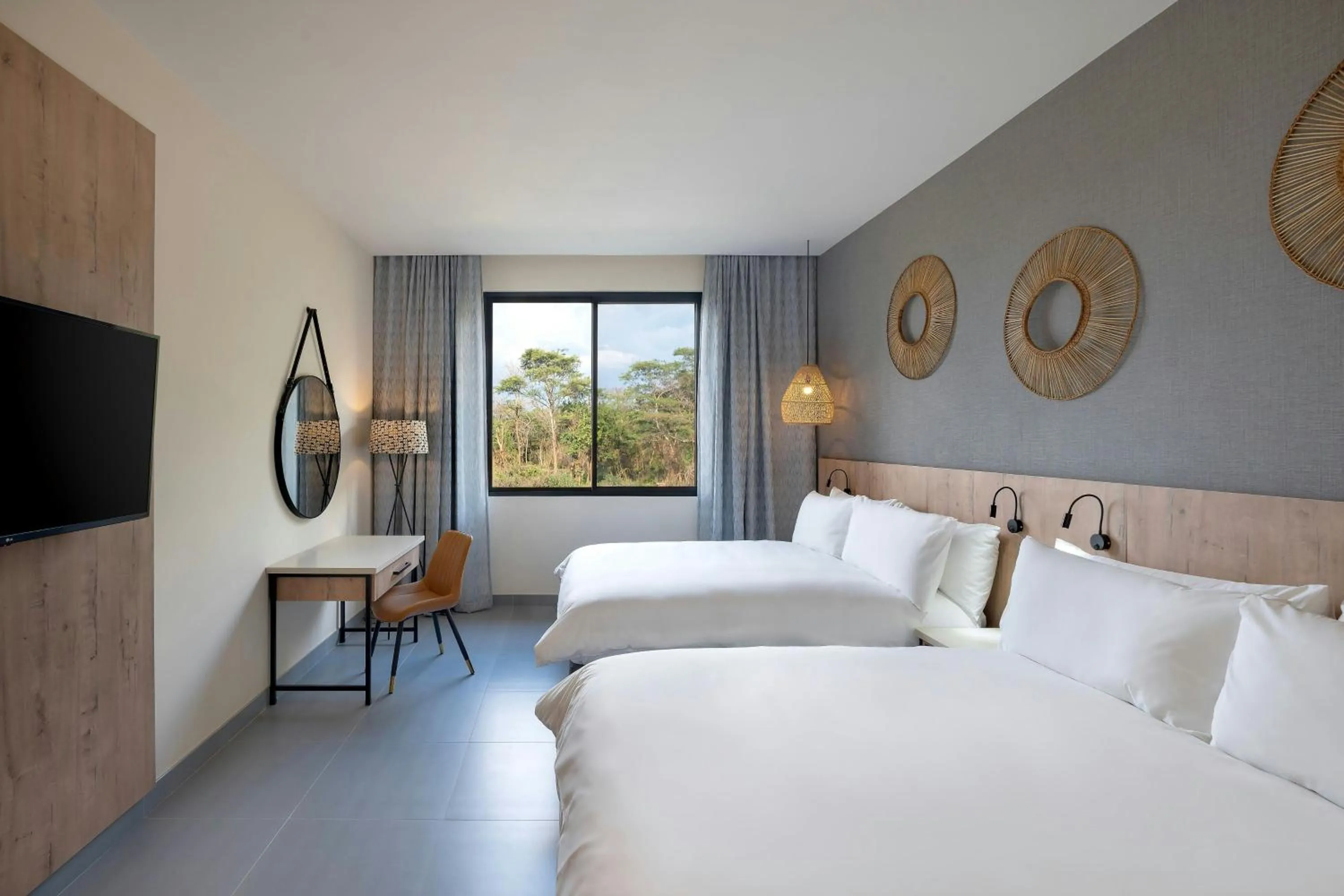 Photo of the whole room, Bed in Protea Hotel by Marriott Ndola