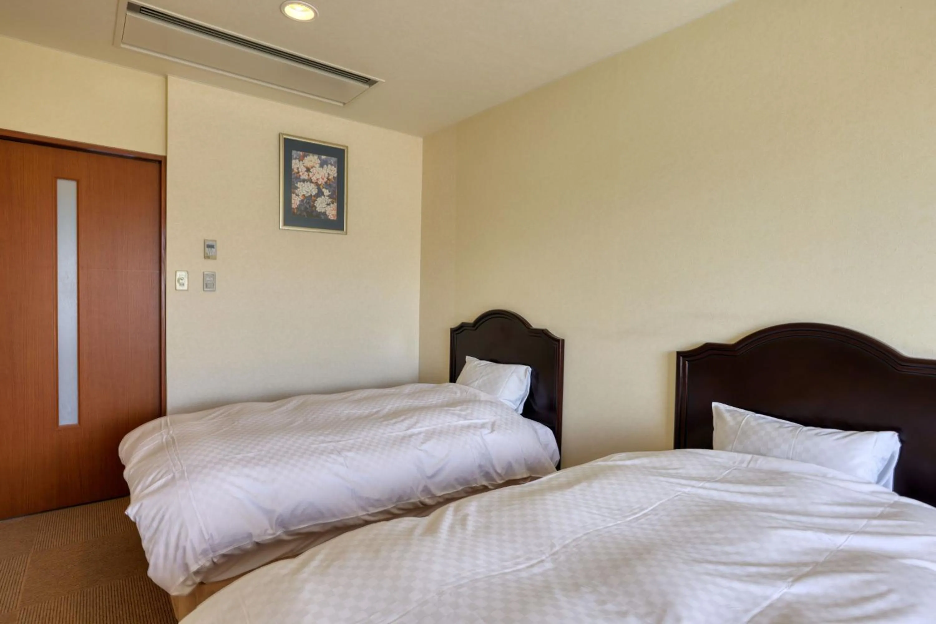 Bed in Fuji Matsuzono Hotel