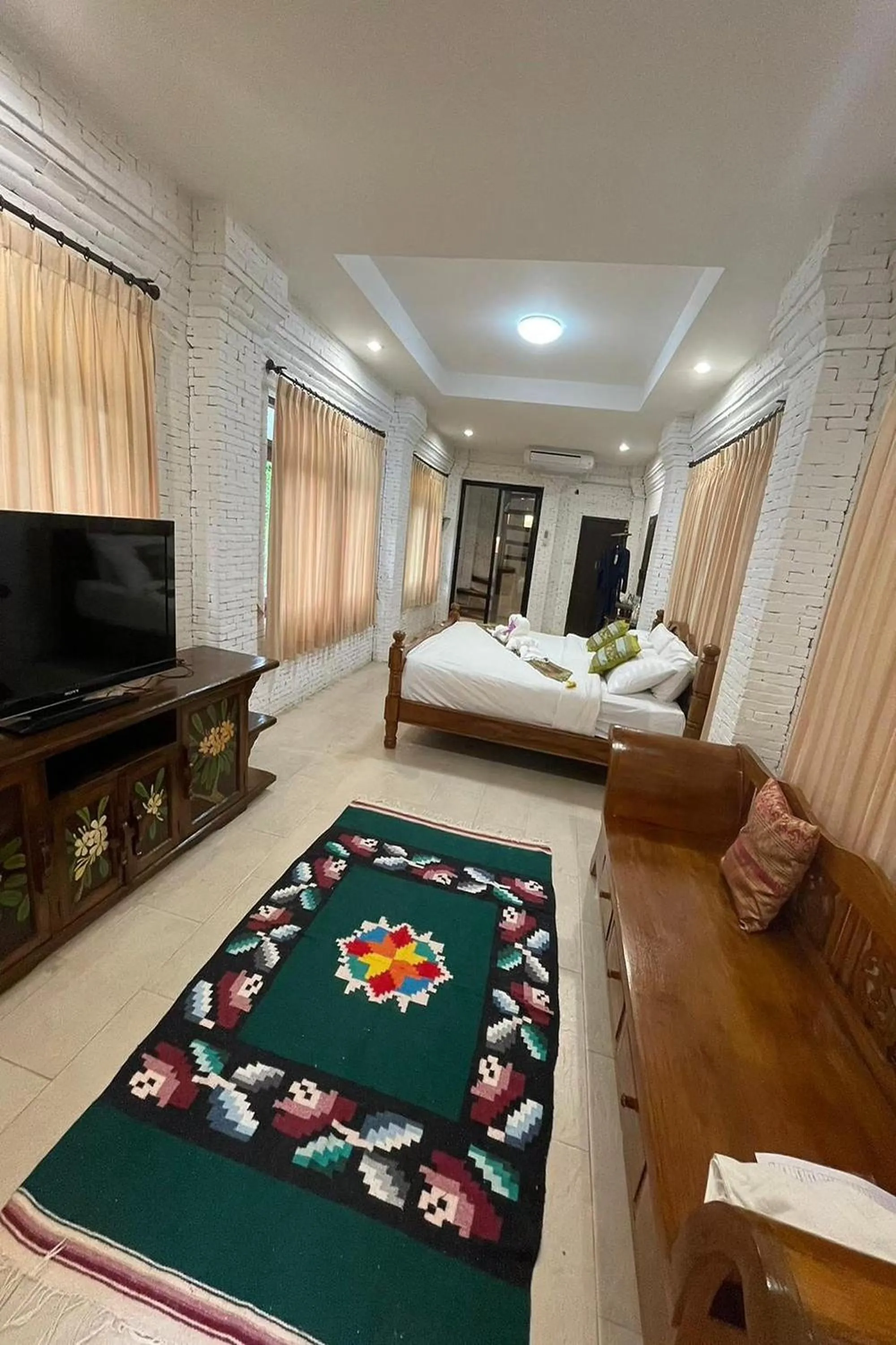 Bed in Baan Tawai Lanna Resort
