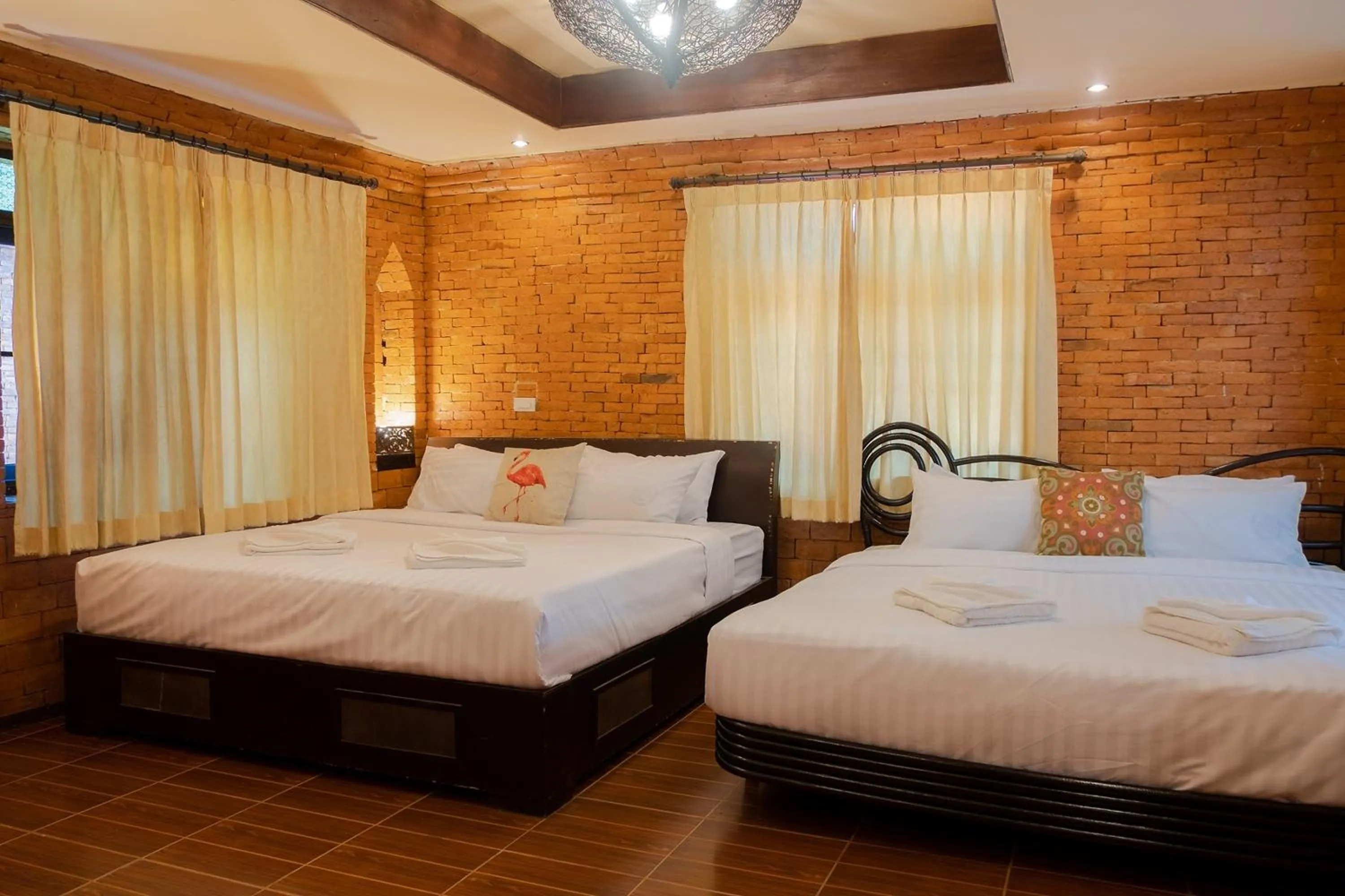 Bed in Baan Tawai Lanna Resort
