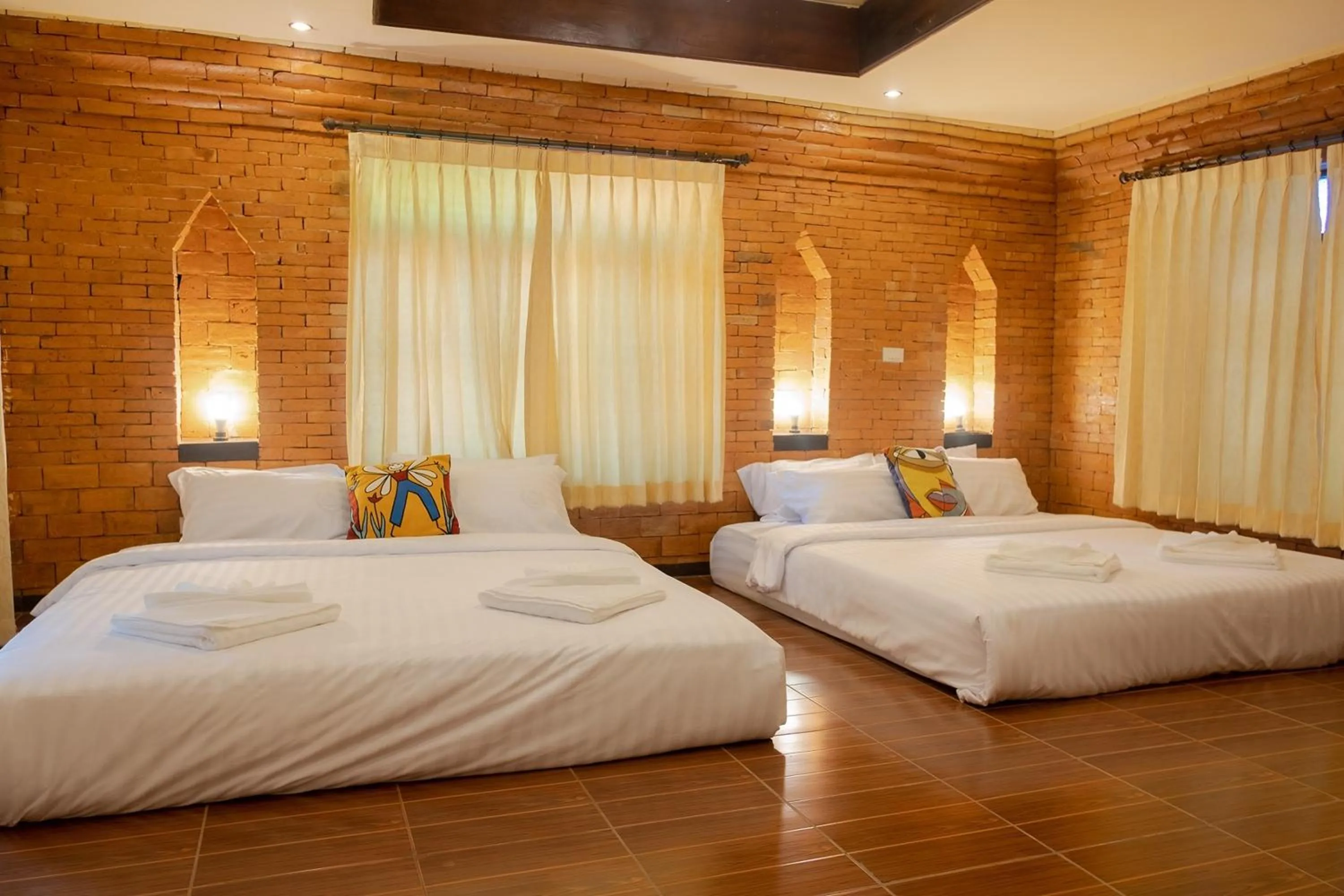 Bed in Baan Tawai Lanna Resort