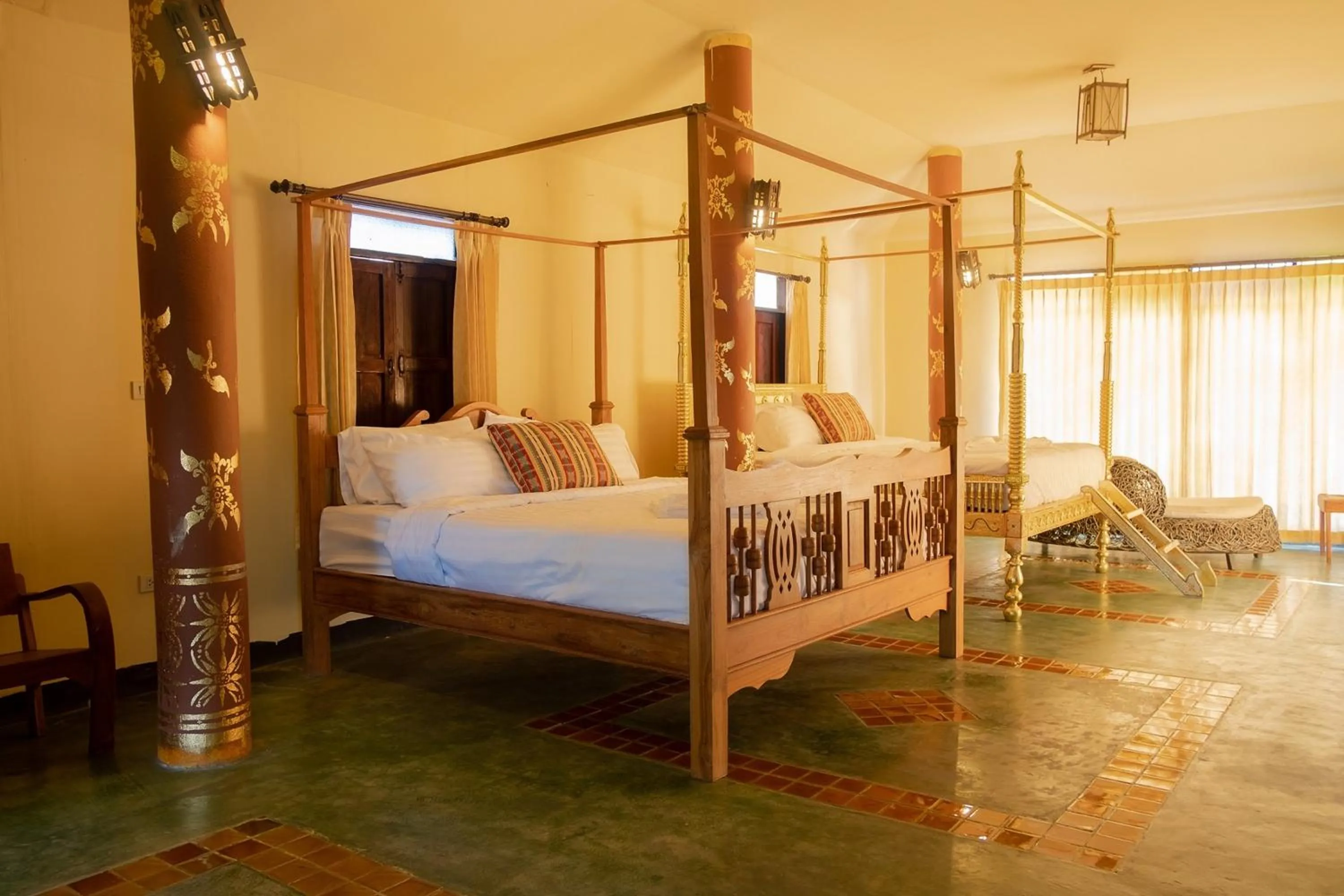 Bed in Baan Tawai Lanna Resort