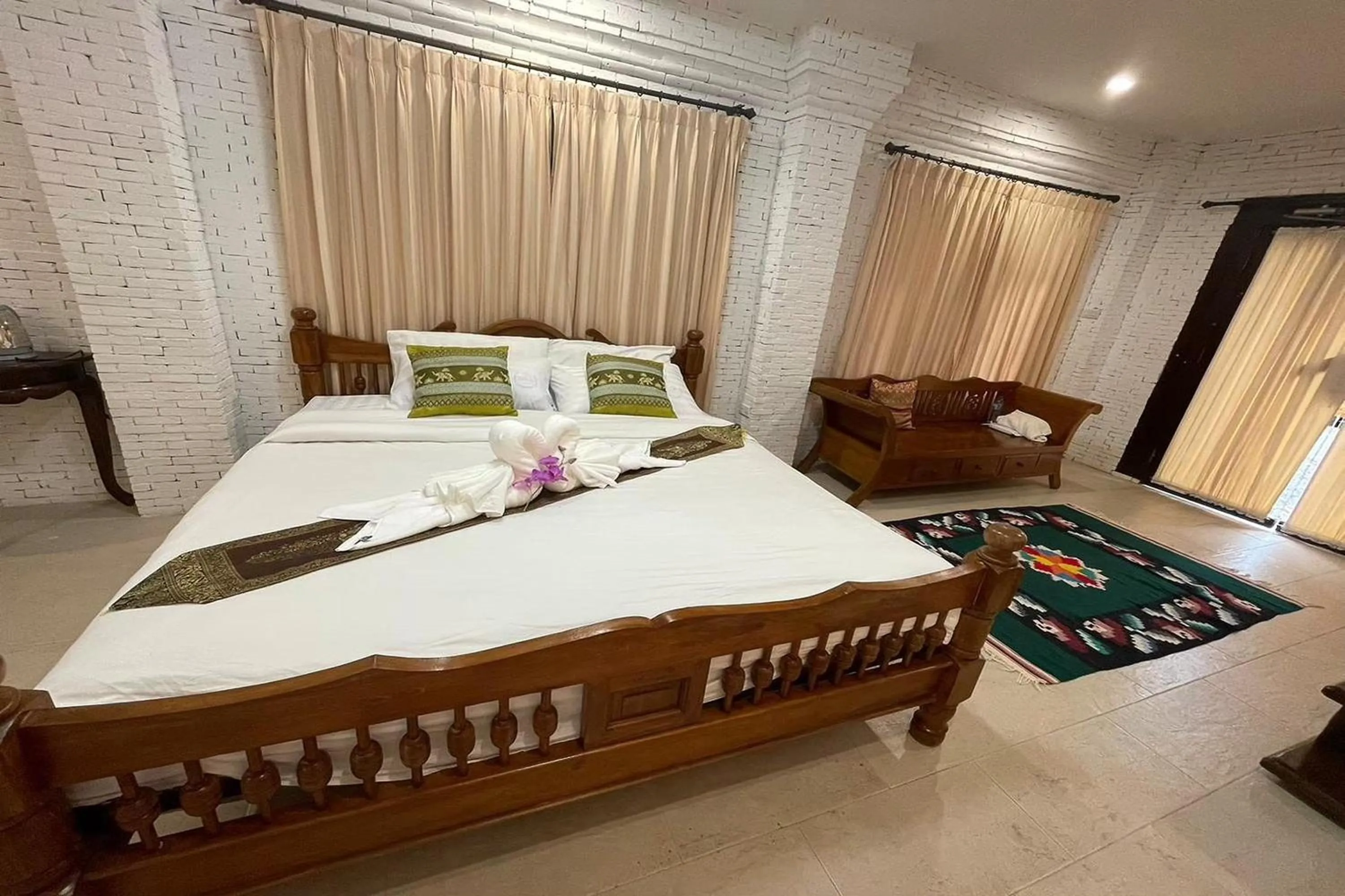 Bed in Baan Tawai Lanna Resort