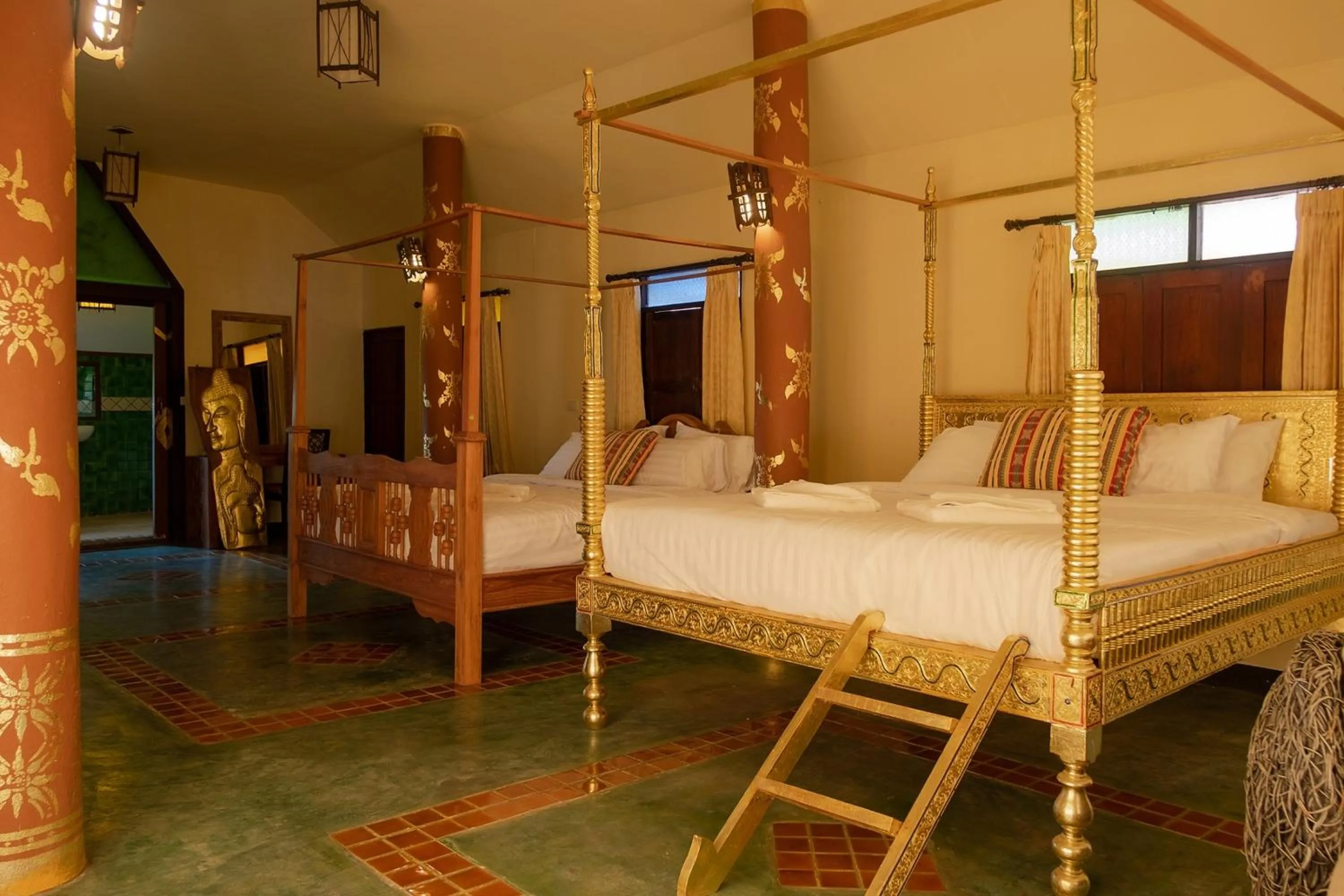 Bed in Baan Tawai Lanna Resort