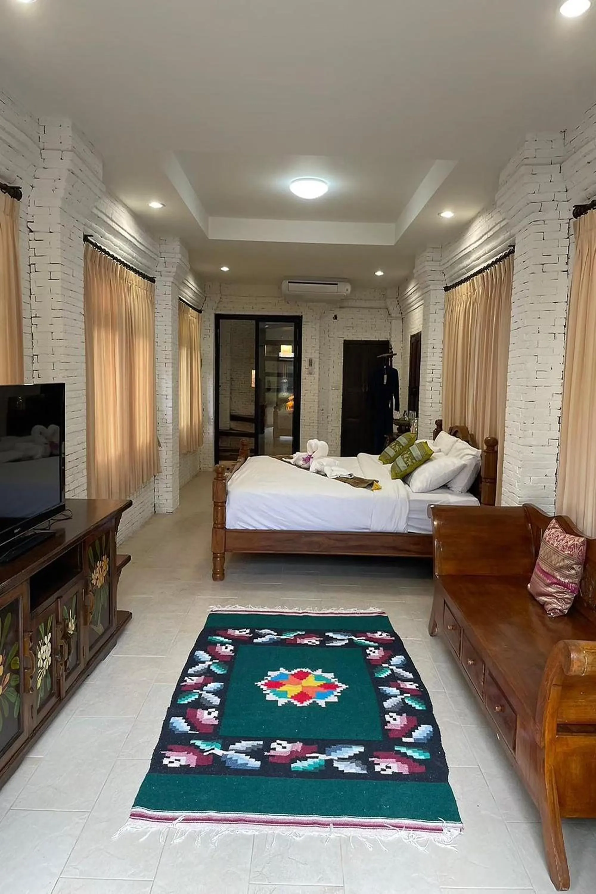 Bed in Baan Tawai Lanna Resort