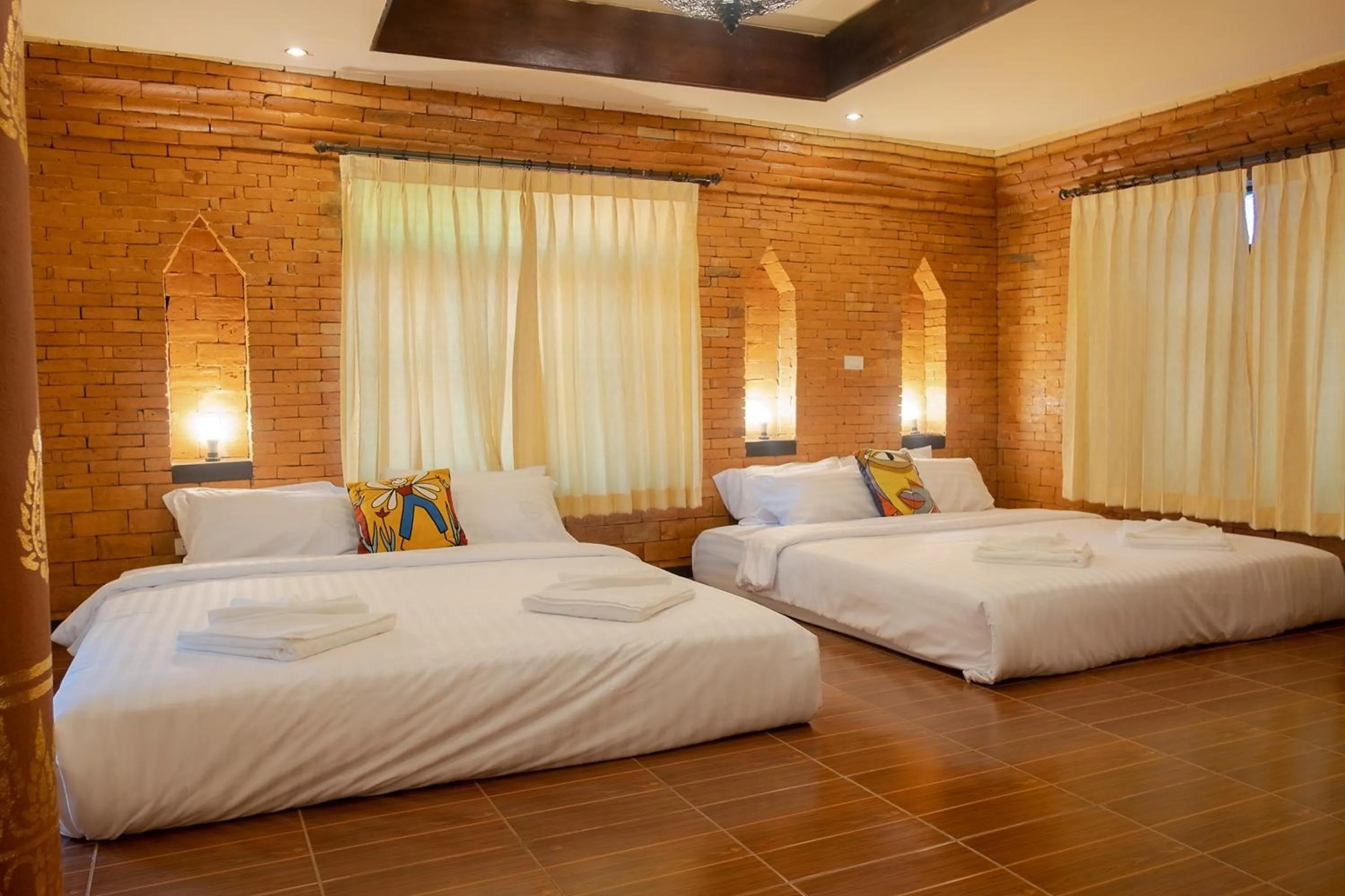 Bed in Baan Tawai Lanna Resort