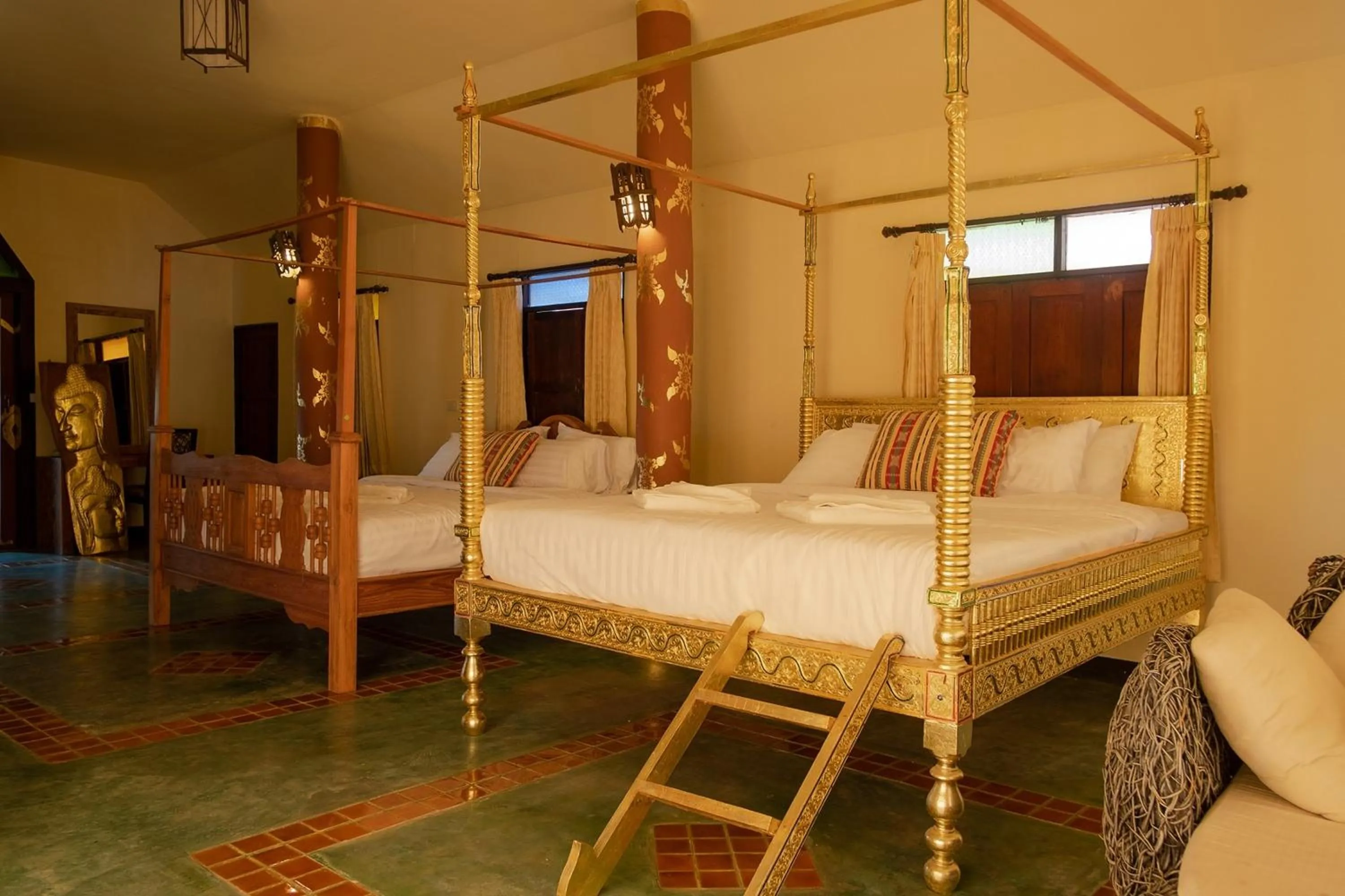 Bed in Baan Tawai Lanna Resort