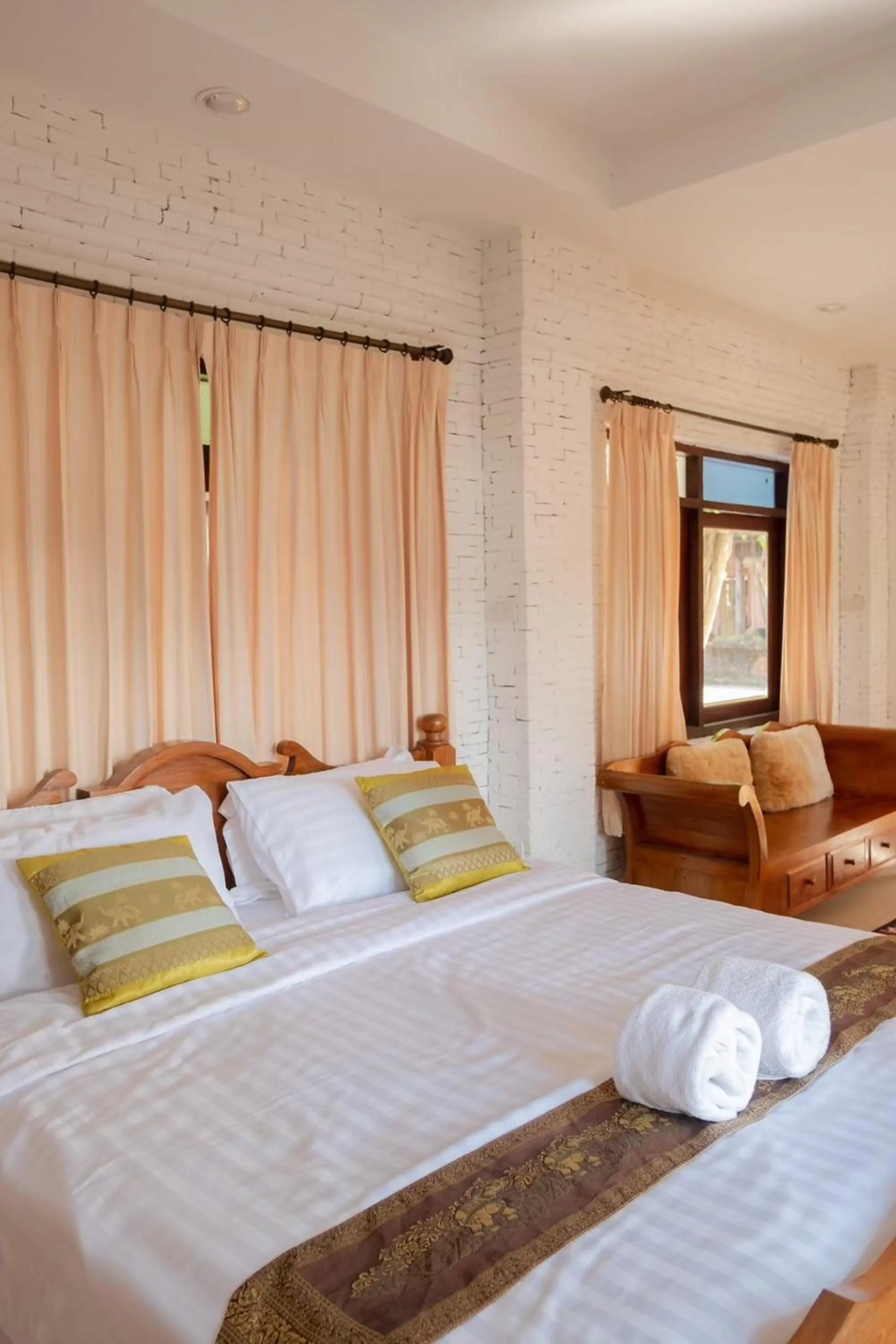 Bed in Baan Tawai Lanna Resort