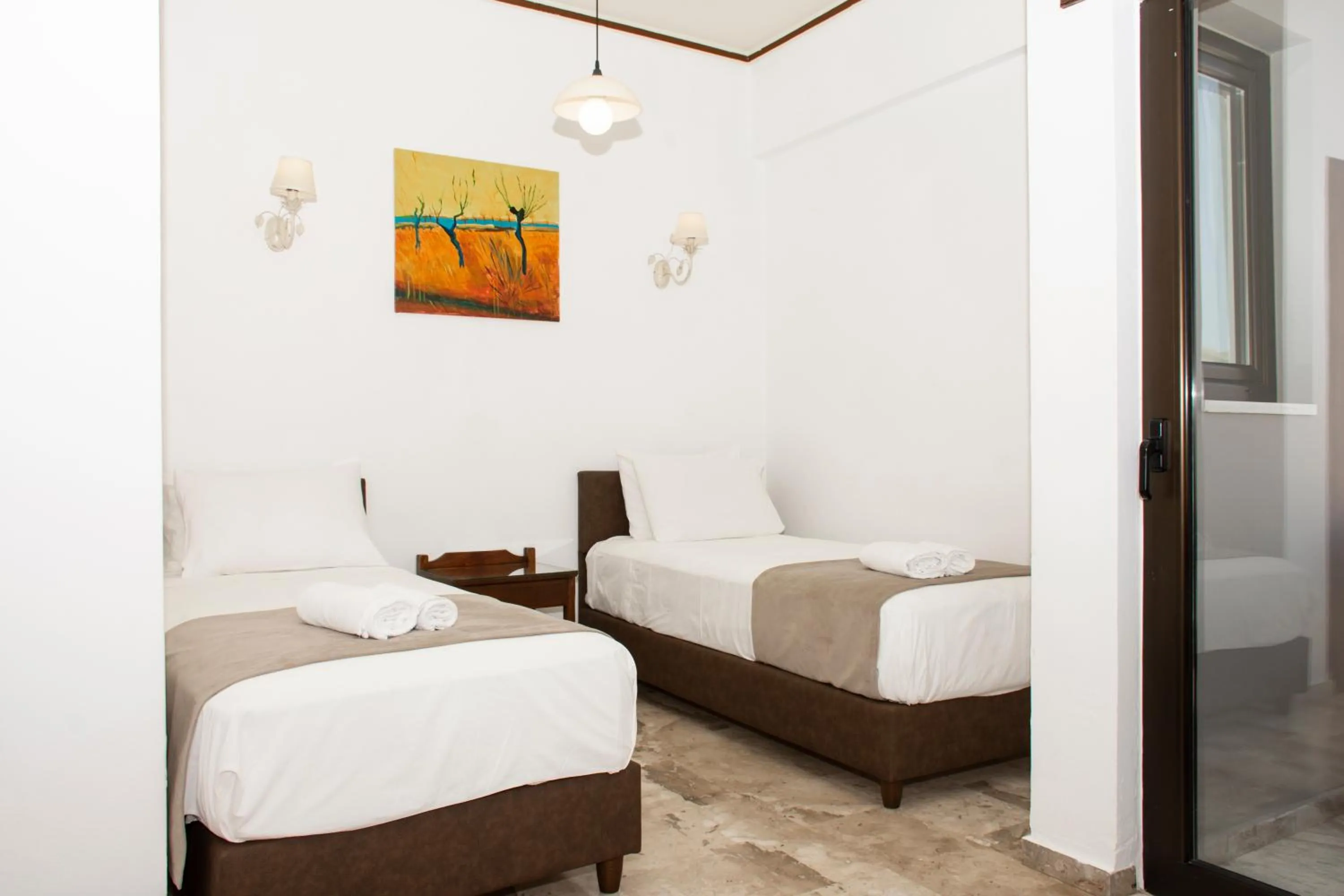 Bed in Argo Rooms-Papadakis