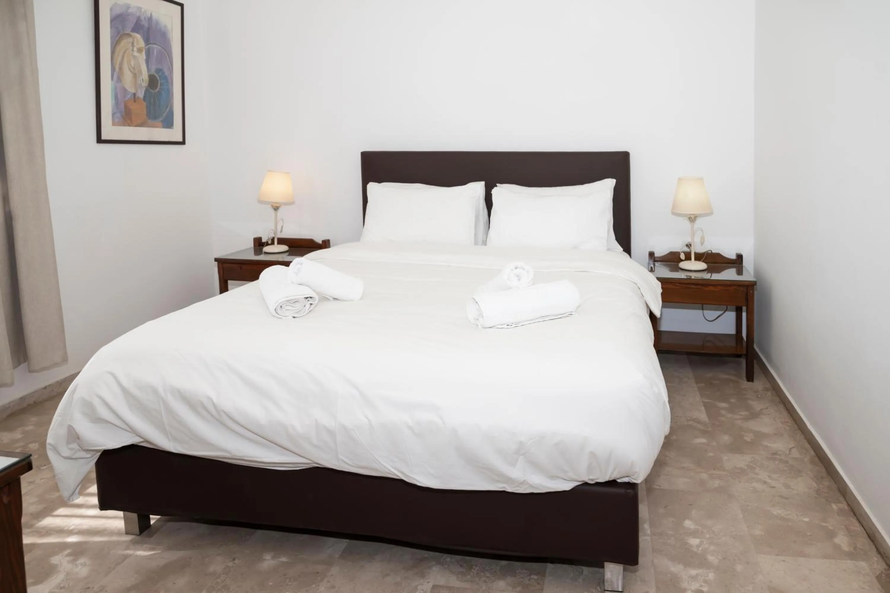 Bed in Argo Rooms-Papadakis