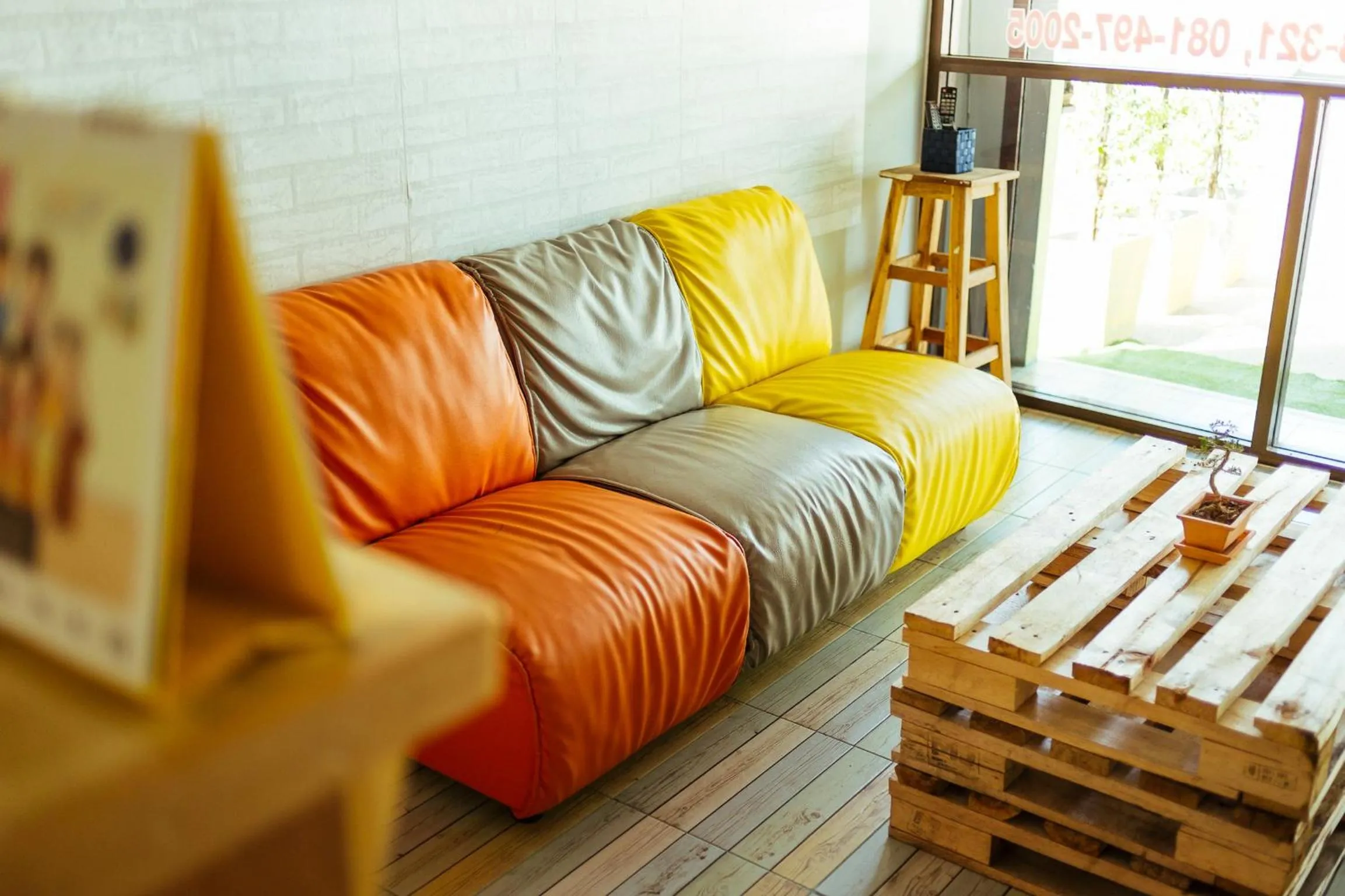 Communal lounge/ TV room in Malai Place Lampang