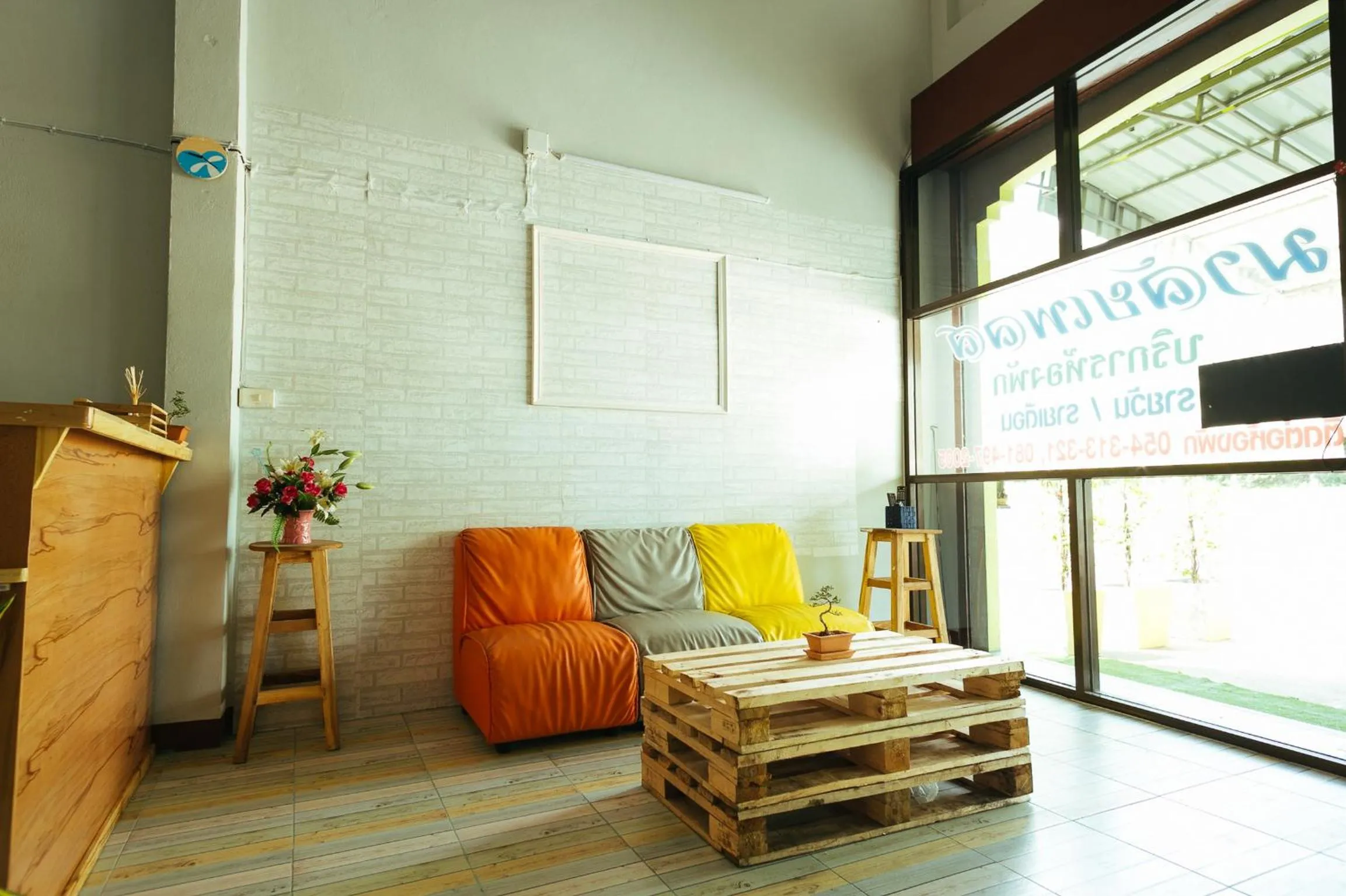 Communal lounge/ TV room in Malai Place Lampang