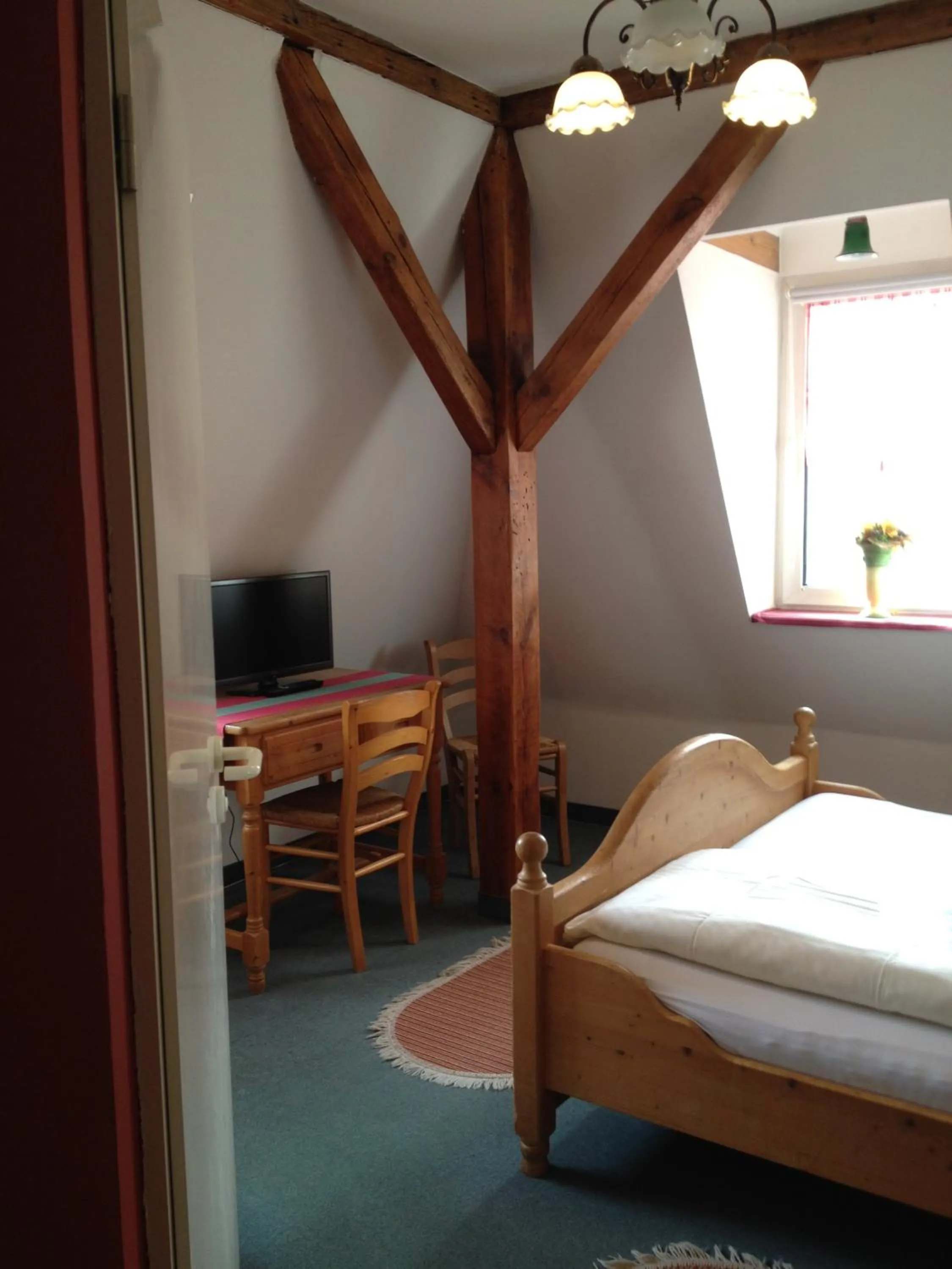 Photo of the whole room, Bed in Bergschlößchen