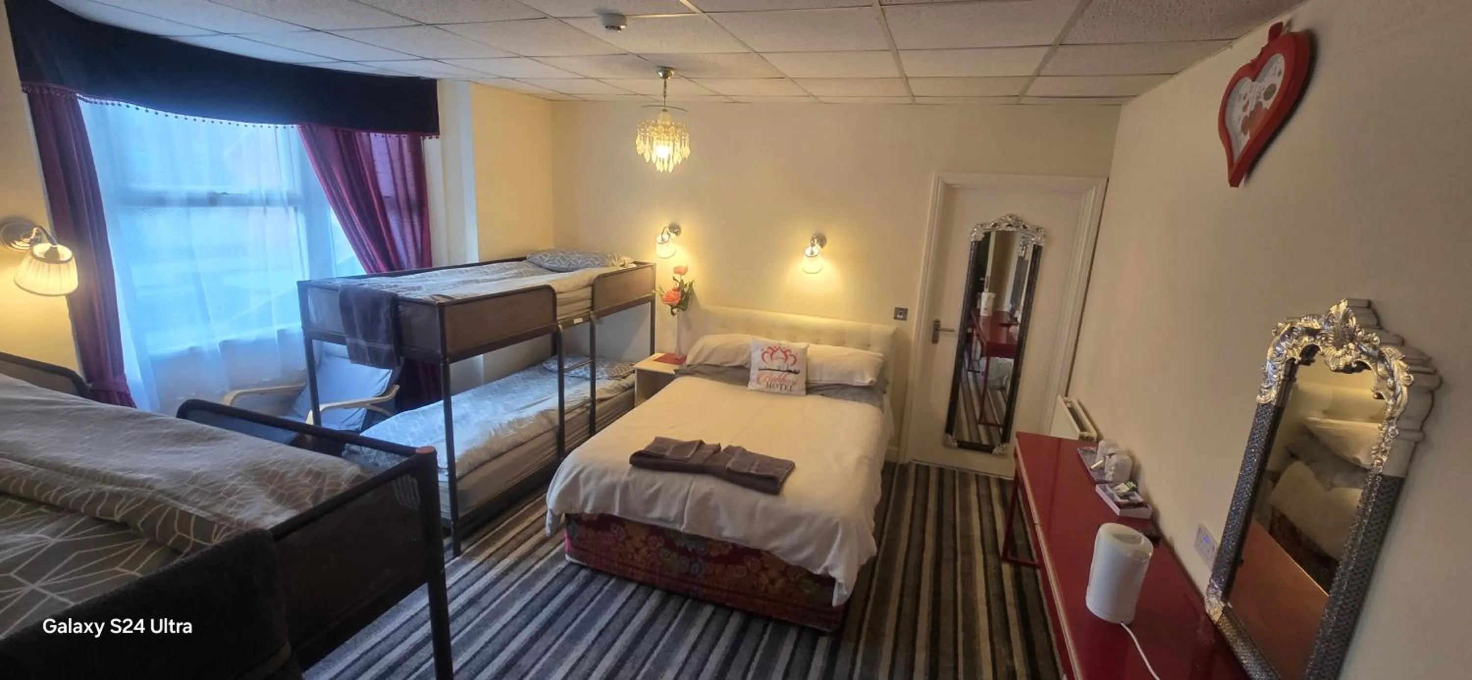 Bed in BUKHARI Hotel