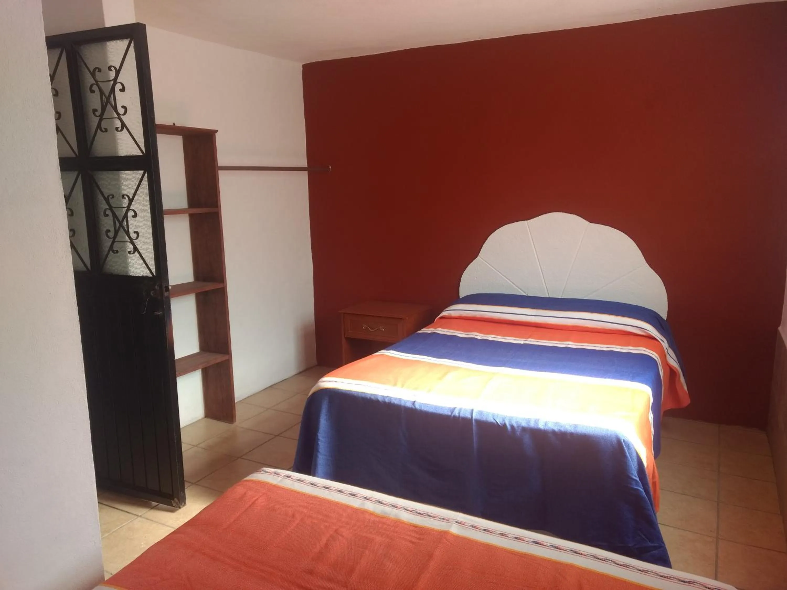 Bed in Hotel Hacienda Morales.