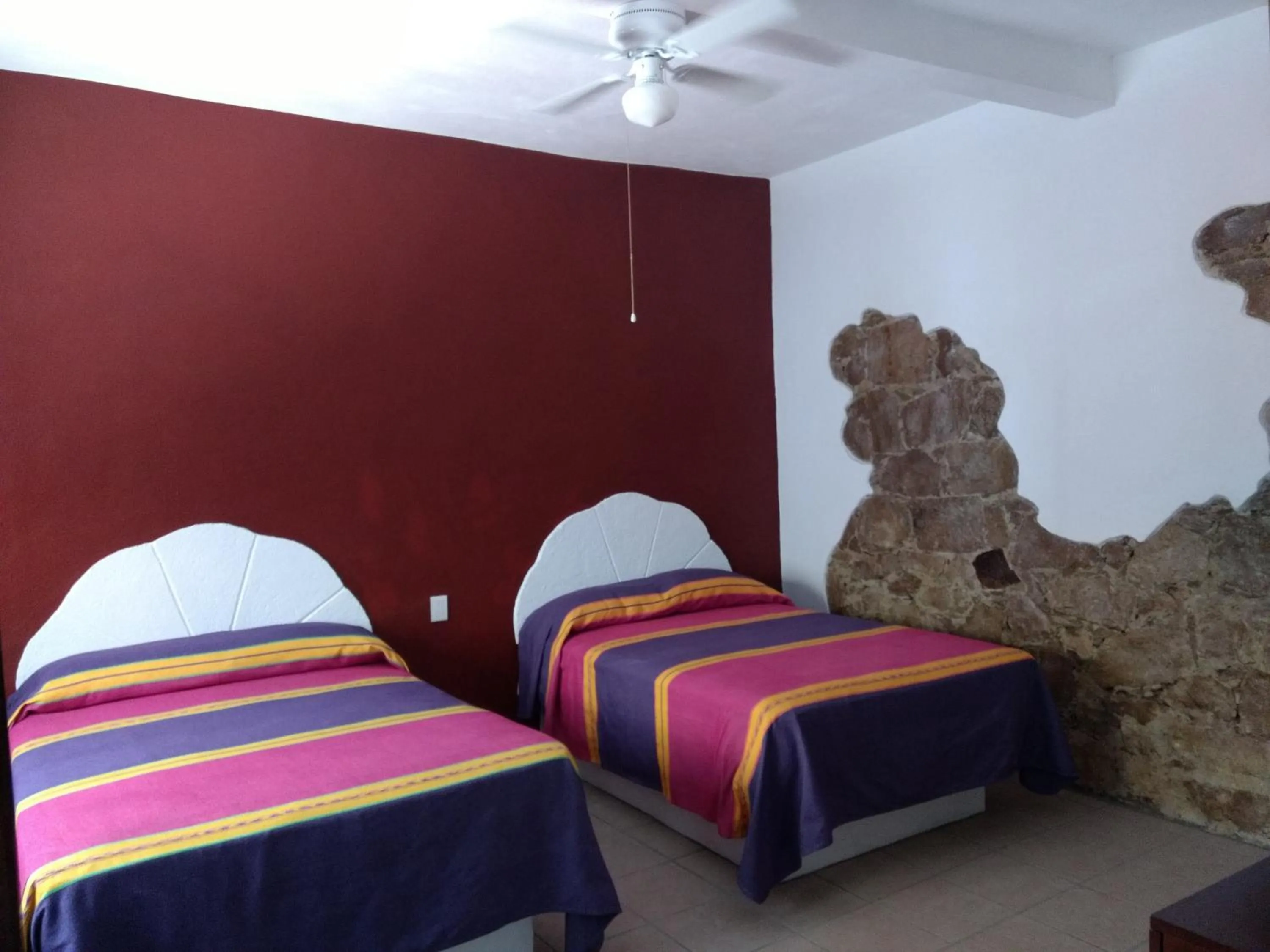 Bed in Hotel Hacienda Morales.