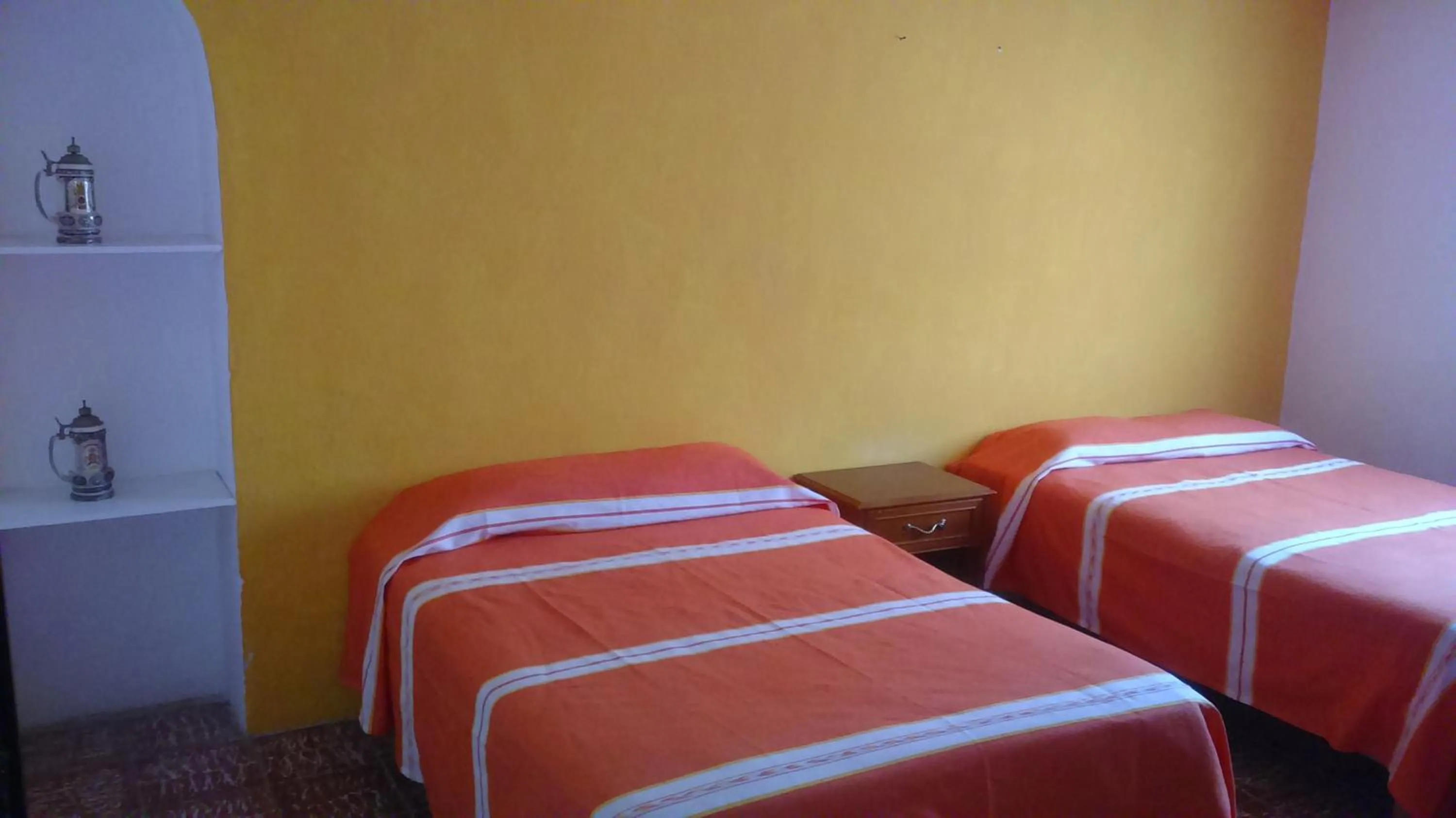 Bed in Hotel Hacienda Morales.