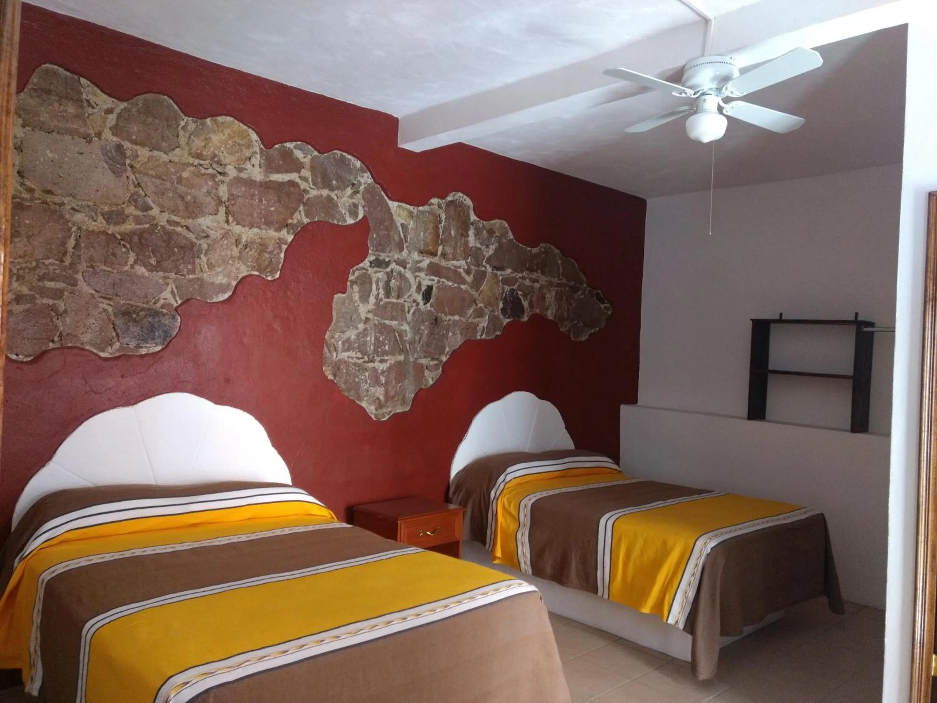 Bed in Hotel Hacienda Morales.