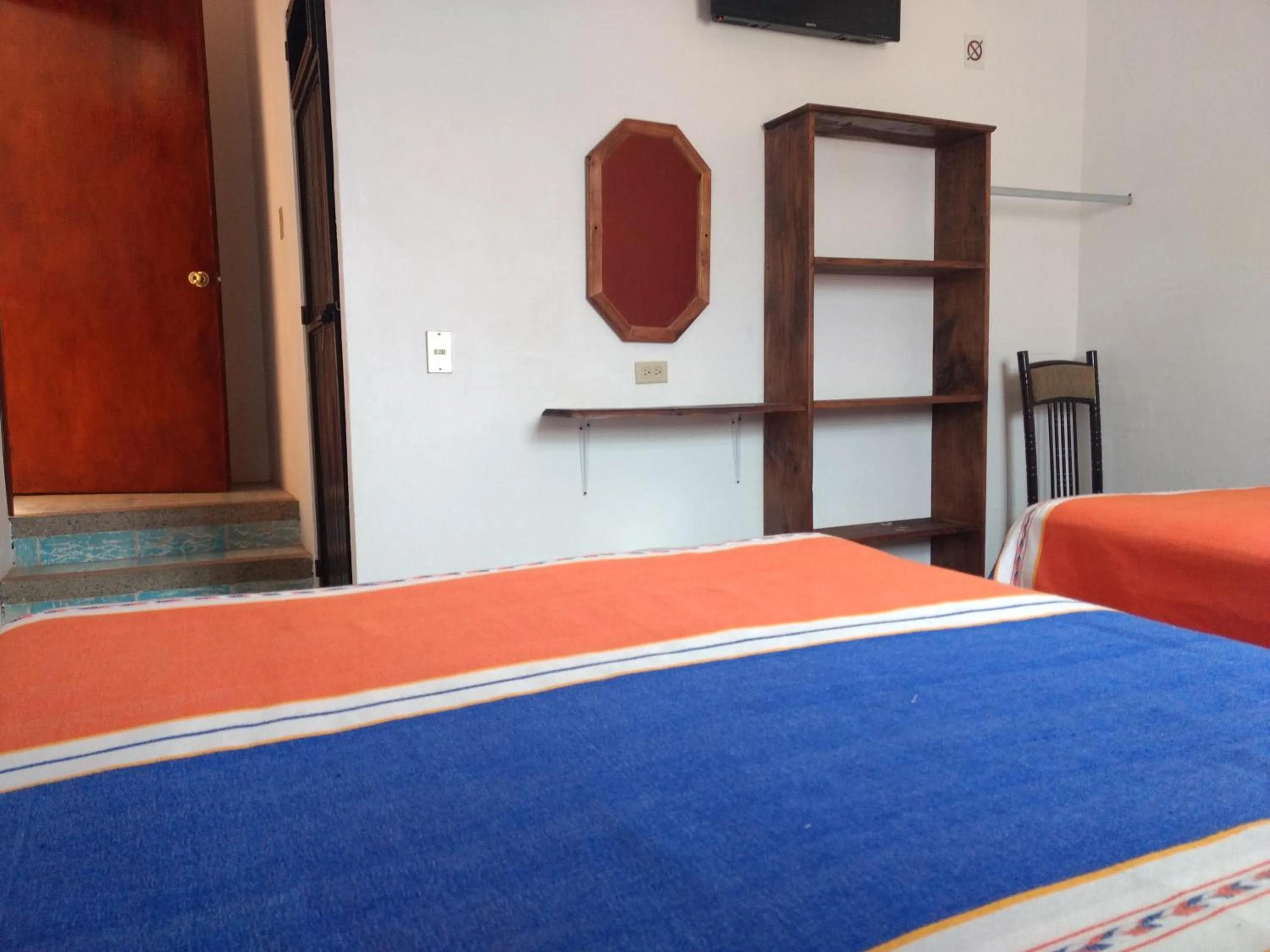 Bed in Hotel Hacienda Morales.