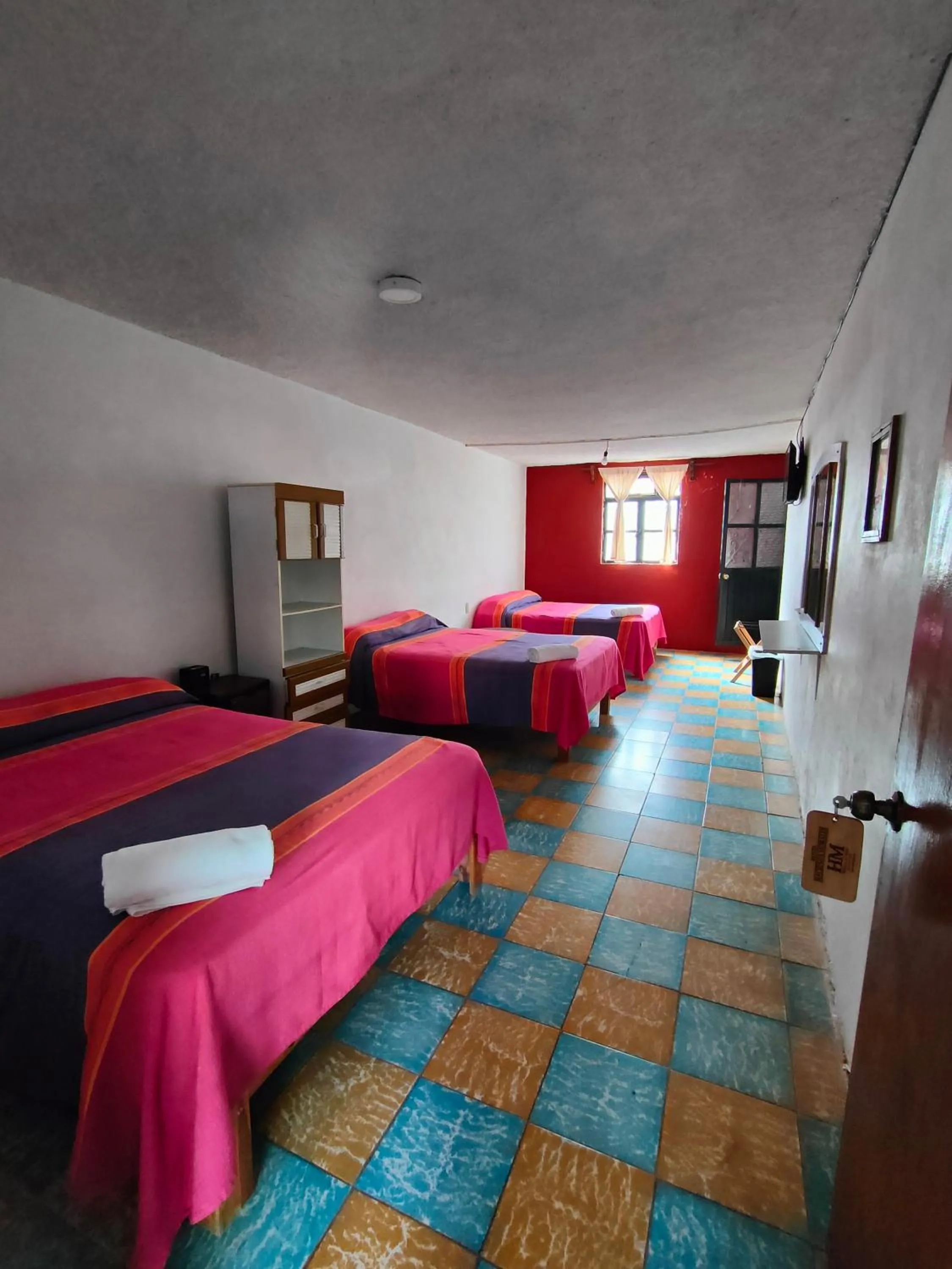 Bed in Hotel Hacienda Morales.