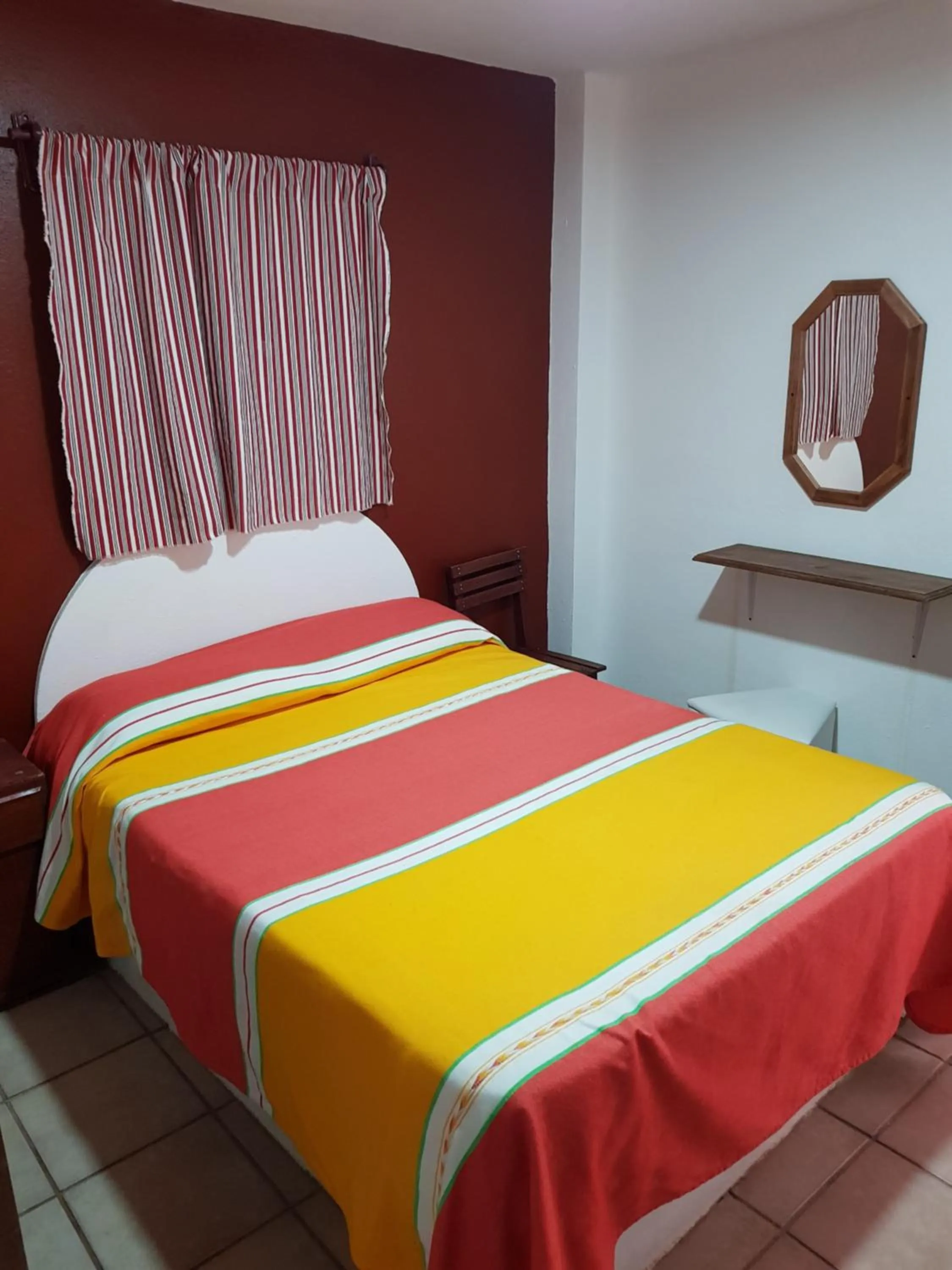 Bed in Hotel Hacienda Morales.