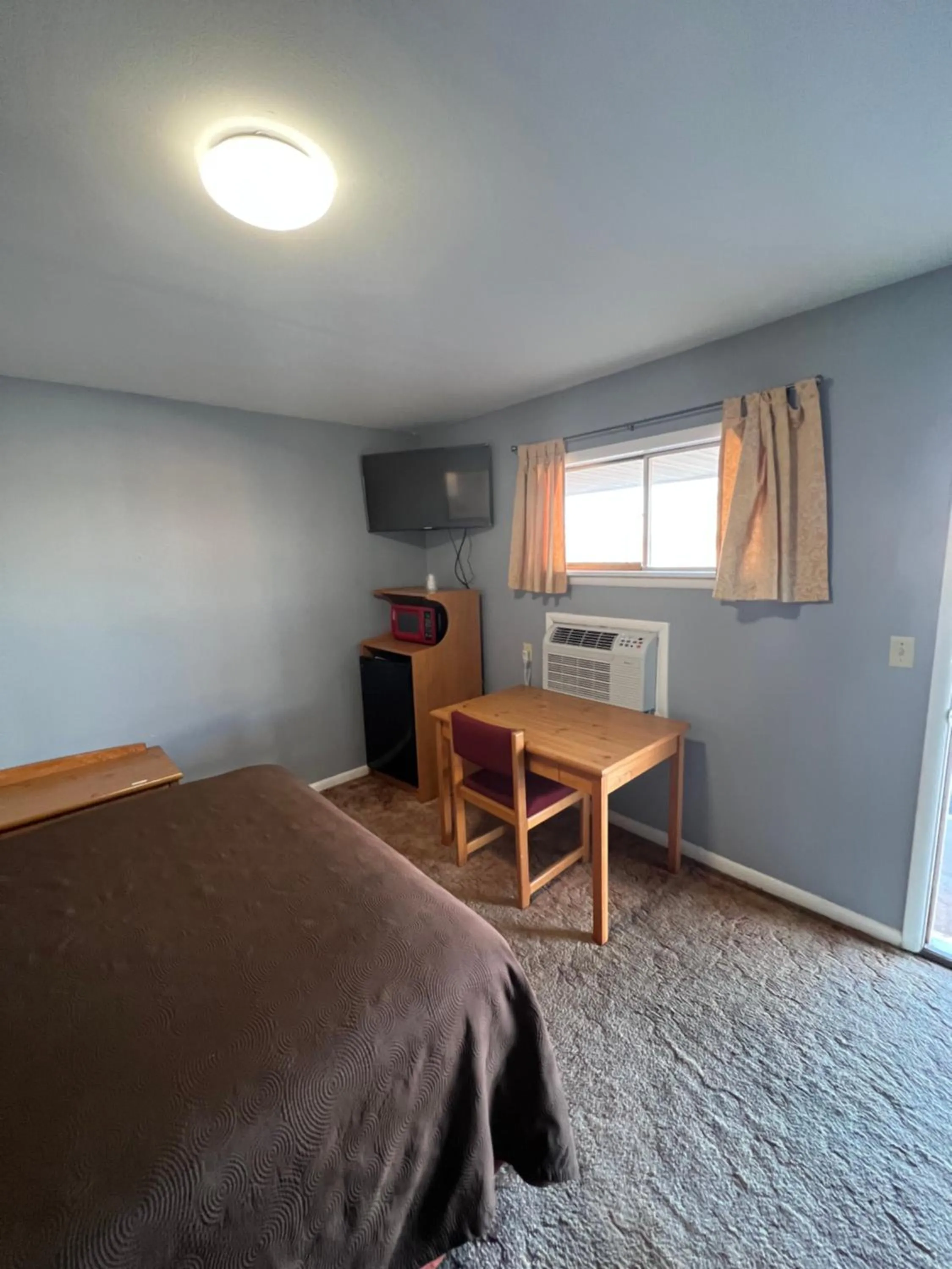 Bed in Western Motel