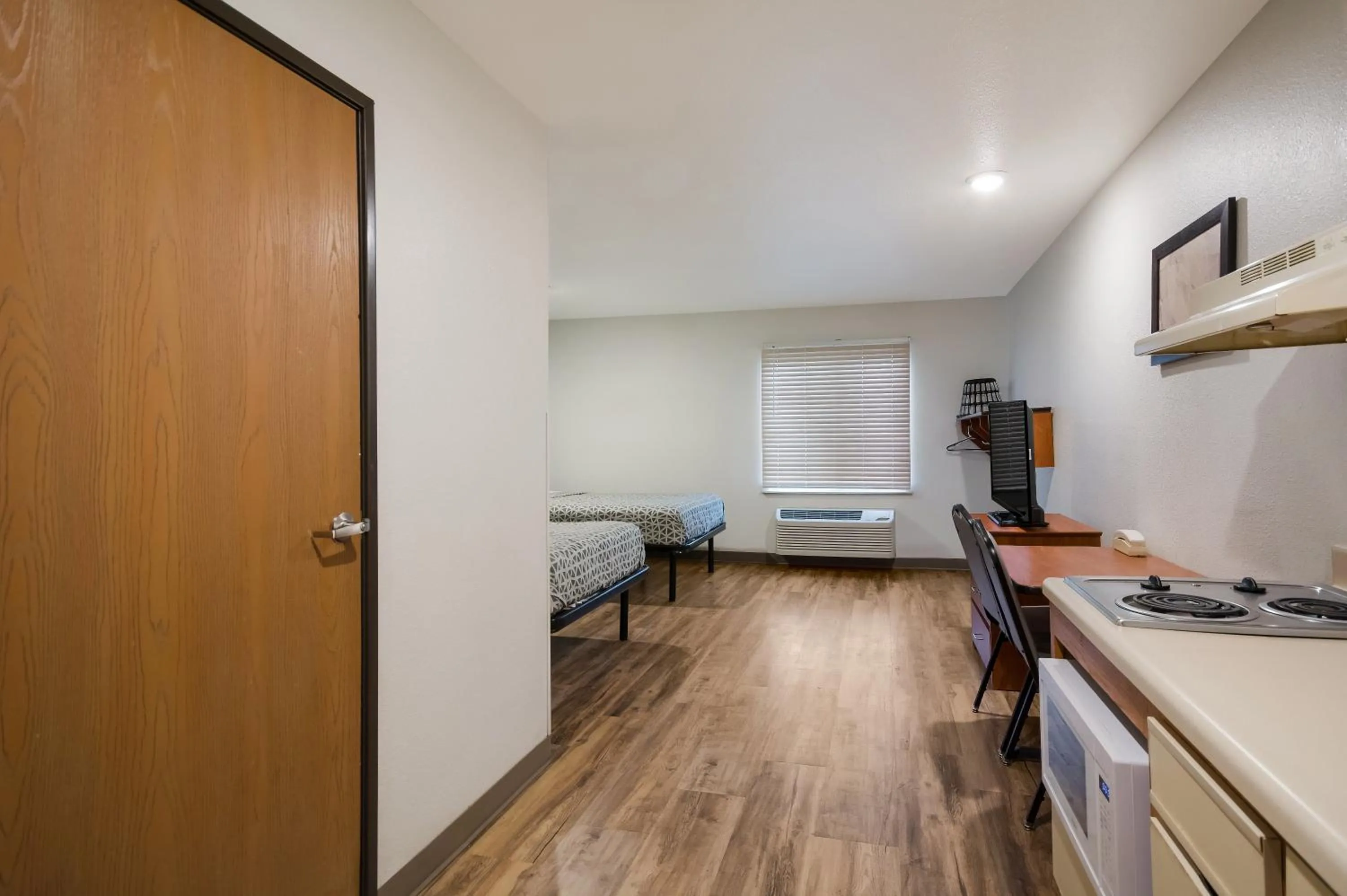 Bedroom, Bed in WoodSpring Suites Lexington Southeast