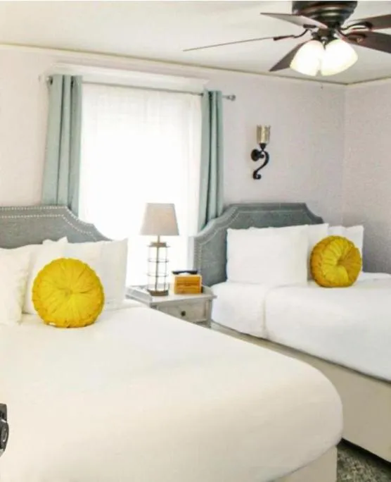 Bed in Inn on Charlotte Boutique Hotel