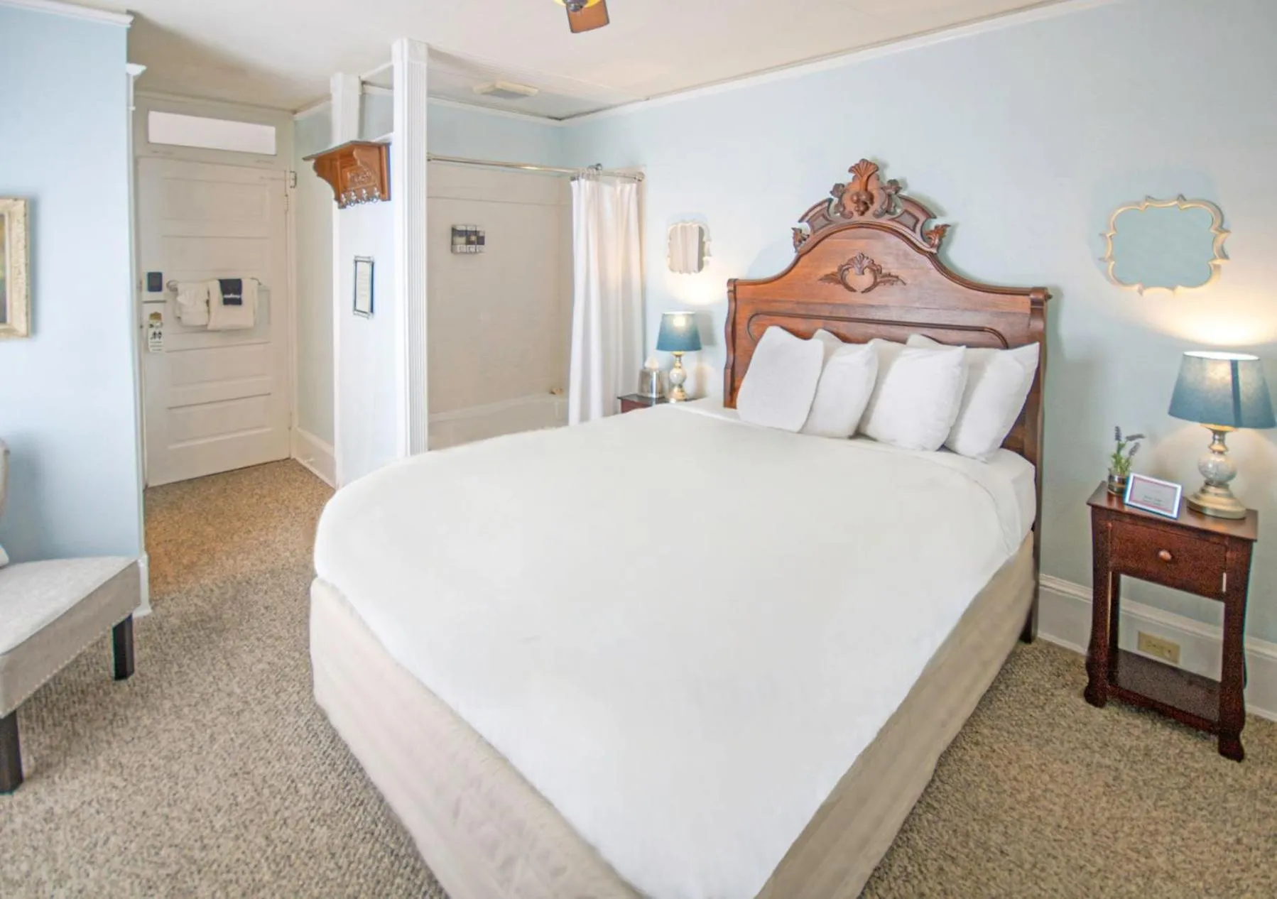 Bed in Inn on Charlotte Boutique Hotel