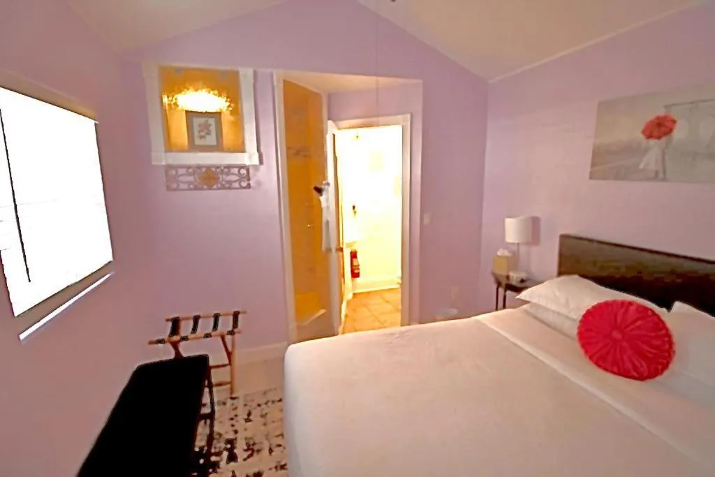 Bed in Inn on Charlotte Boutique Hotel