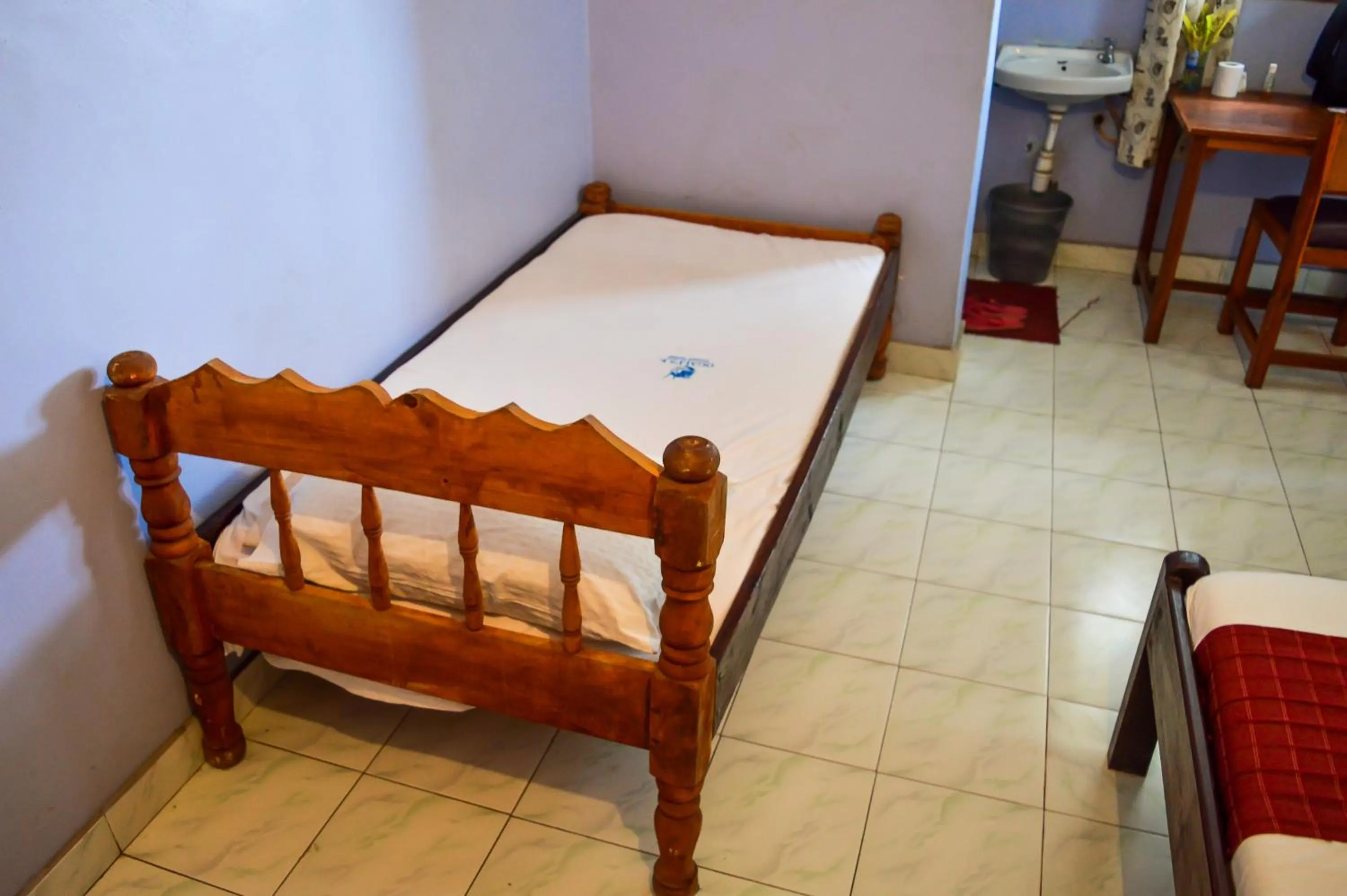 Bed in Ogalis K-coast Hotel