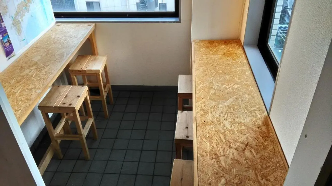 Communal lounge/ TV room in Base Inn Komagome Tokyo