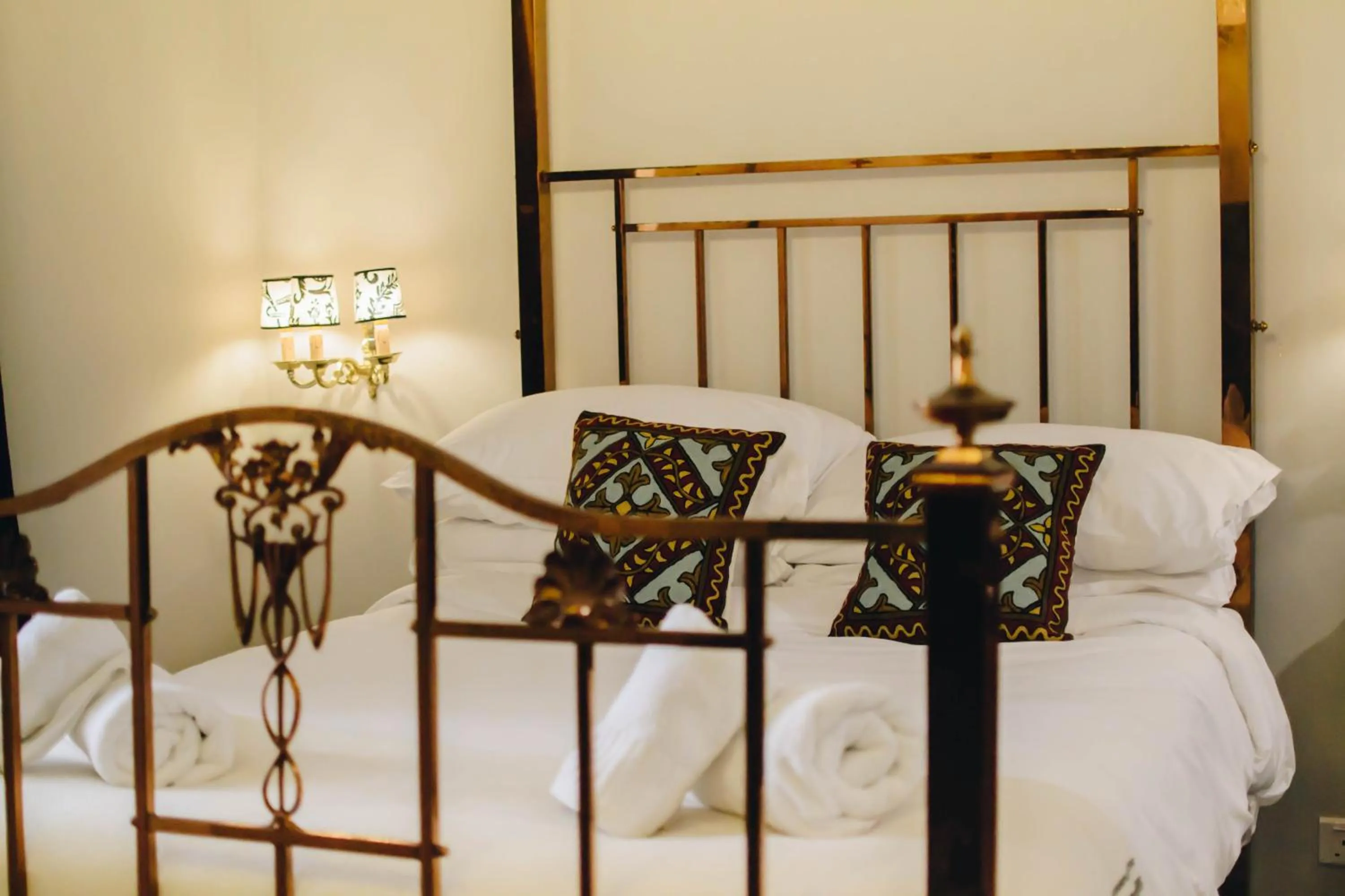 Bed in Sally Port Suites