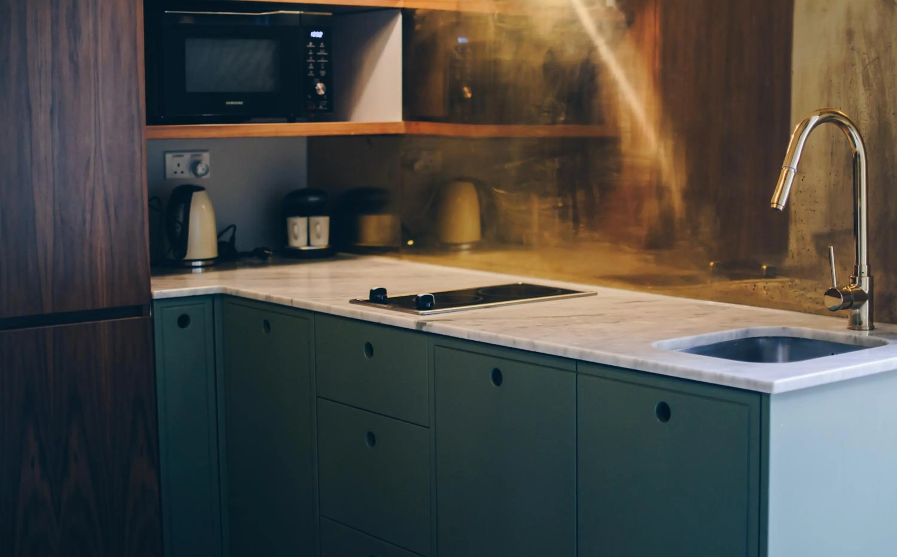 Kitchen or kitchenette in Sally Port Suites