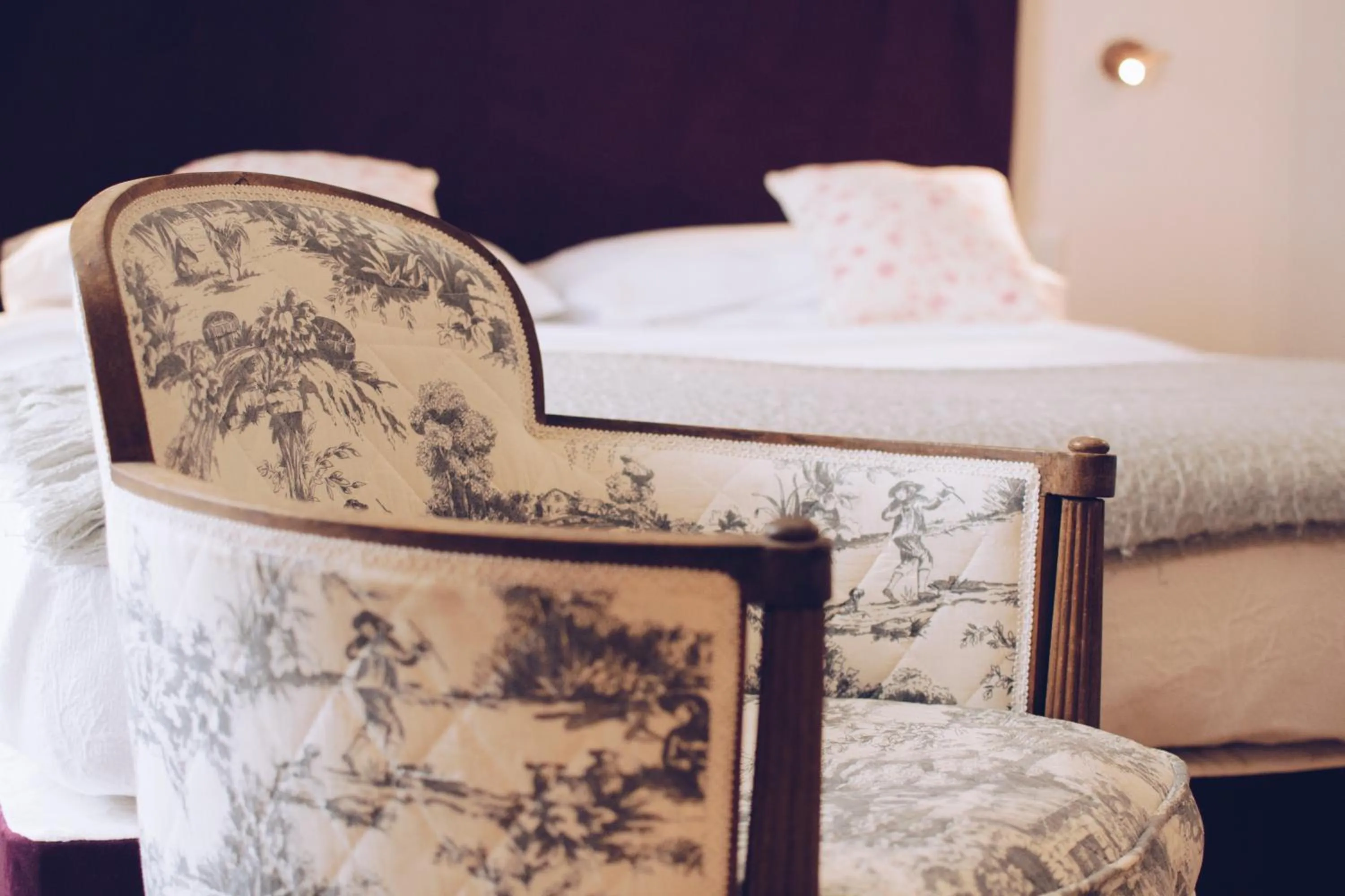 Seating area, Bed in Sally Port Suites