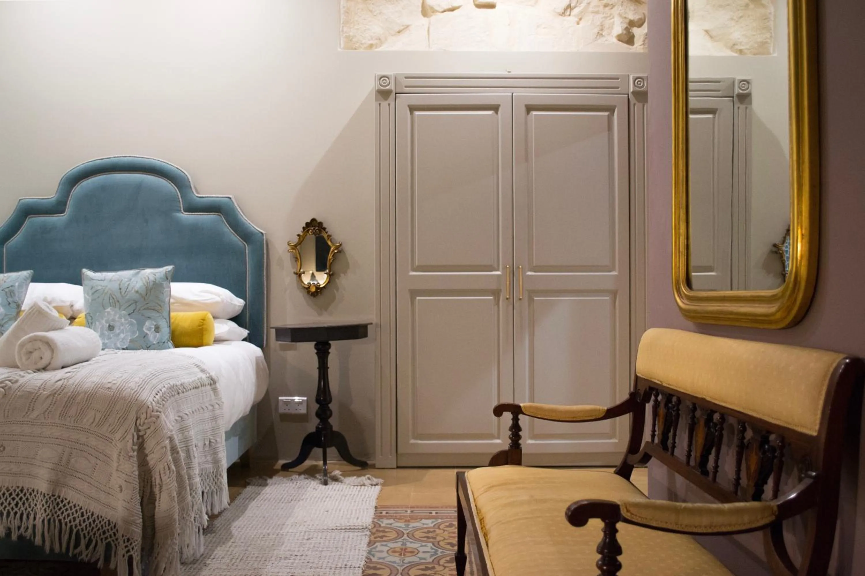 Bed in Sally Port Suites