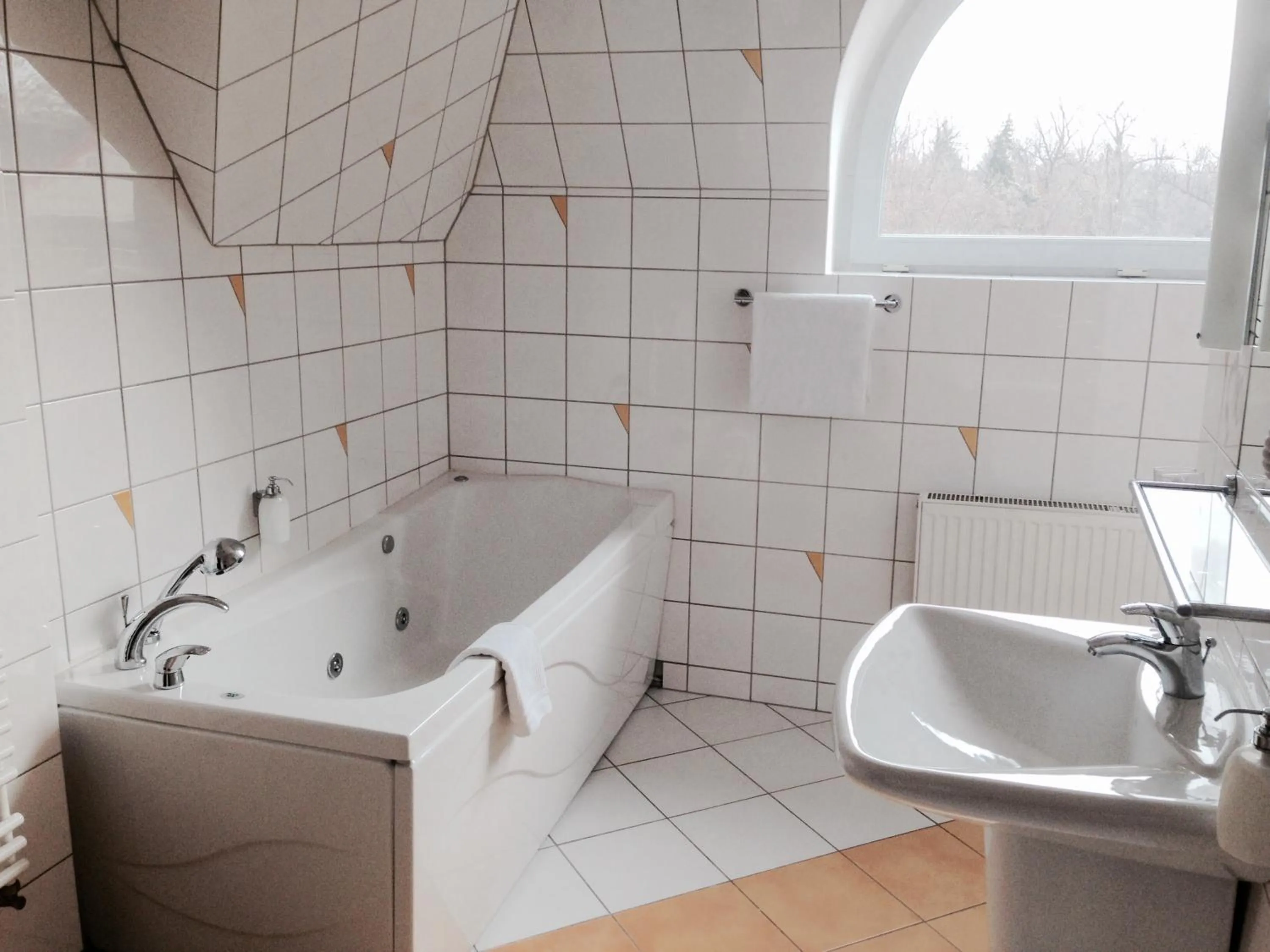 Bathroom in Hotel Bella