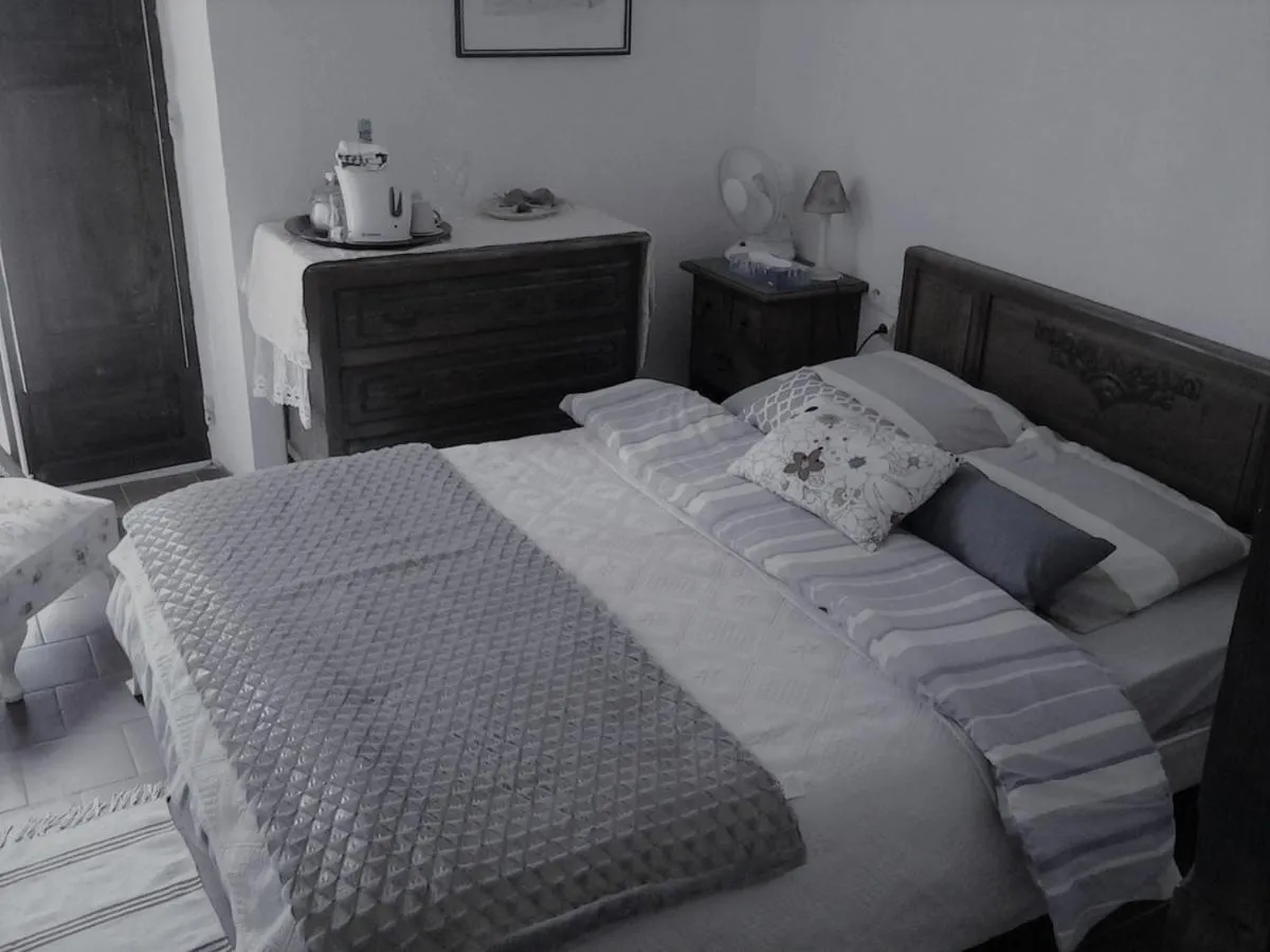 Bed in Maison De L'Orb